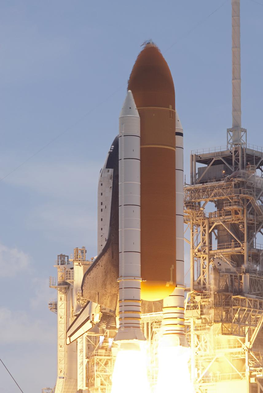 CAPE CANAVERAL, Fla. - Space shuttle Atlantis' twin solid rocket boosters ignite to propel the spacecraft off NASA Kennedy Space Center's Launch Pad 39A and into orbit at 2:20 p.m. EDT on May 14. On board Atlantis, for its last planned flight, are six veteran NASA astronauts.  Atlantis' primary payload for the STS-132 mission is the Russian-built Mini Research Module-1, which will provide additional storage space and a new docking port for Russian Soyuz and Progress spacecraft aboard the International Space Station. STS-132 is the 132nd shuttle flight, the 32nd for Atlantis and the 34th shuttle mission dedicated to station assembly and maintenance. For more information on the STS-132 mission objectives, payload and crew, visit www.nasa.gov_mission_pages_shuttle_shuttlemissions_sts132_index.html. Photo credit: NASA_Rusty Backer and Michael Gayle