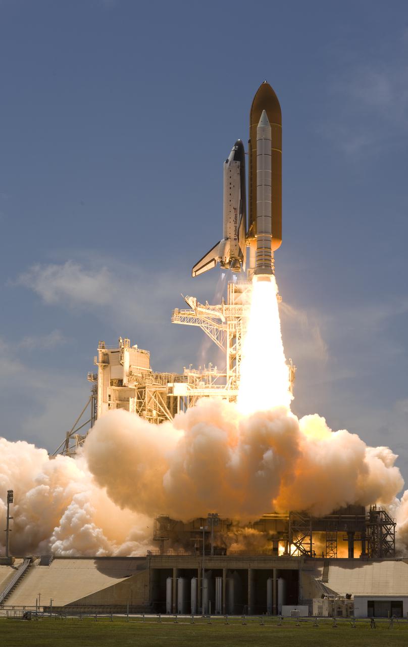 CAPE CANAVERAL, Fla. - At NASA's Kennedy Space Center in Florida, an exhaust plume forms under the mobile launcher platform on Launch Pad 39A as space shuttle Atlantis lifts off on the STS-132 mission to the International Space Station at 2:20 p.m. EDT on May 14.  STS-132 is the 132nd shuttle flight, the 32nd for Atlantis and the 34th shuttle mission dedicated to station assembly and maintenance. For more information on the STS-132 mission objectives, payload and crew, visit www.nasa.gov_mission_pages_shuttle_shuttlemissions_sts132_index.html. Photo courtesy of Scott Andrews
