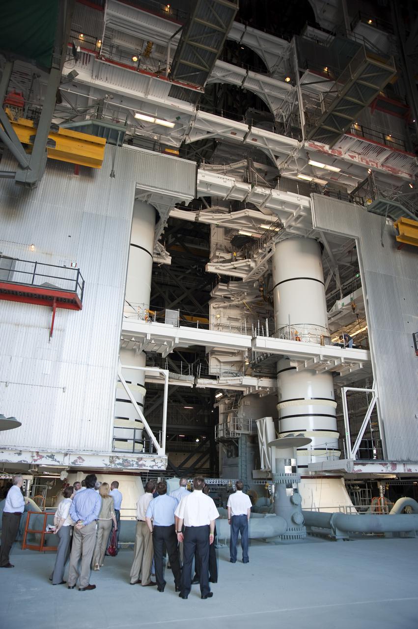 CAPE CANAVERAL, Fla. – Roscosmos delegation members tour the Vehicle Assembly Building and view two solid rocket boosters being assembled at NASA's Kennedy Space Center in Florida where space shuttle Atlantis was prepared for its STS-132 mission to the International Space Station. Delegation members included Deputy Director Vitaly Davydov and Chief of Piloted Programs Directorate Alexey Krasnov.  The delegation watched Atlantis lift off from Launch Pad 39A on May 14, carrying with it the Russian-built Mini Research Module-1 called Rassvet, meaning 'dawn' in Russian. Photo credit: NASA_Kim Shiflett