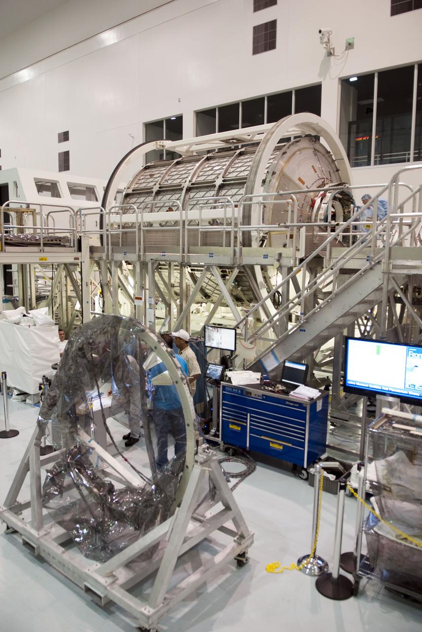 STS-133 COMMON BERTHING MECHANISIM (CMB) SIMULATOR HOIST & TEMPORARY INSTALL TO PERMANENT MULTIPURPOSE MODULE (PMM)