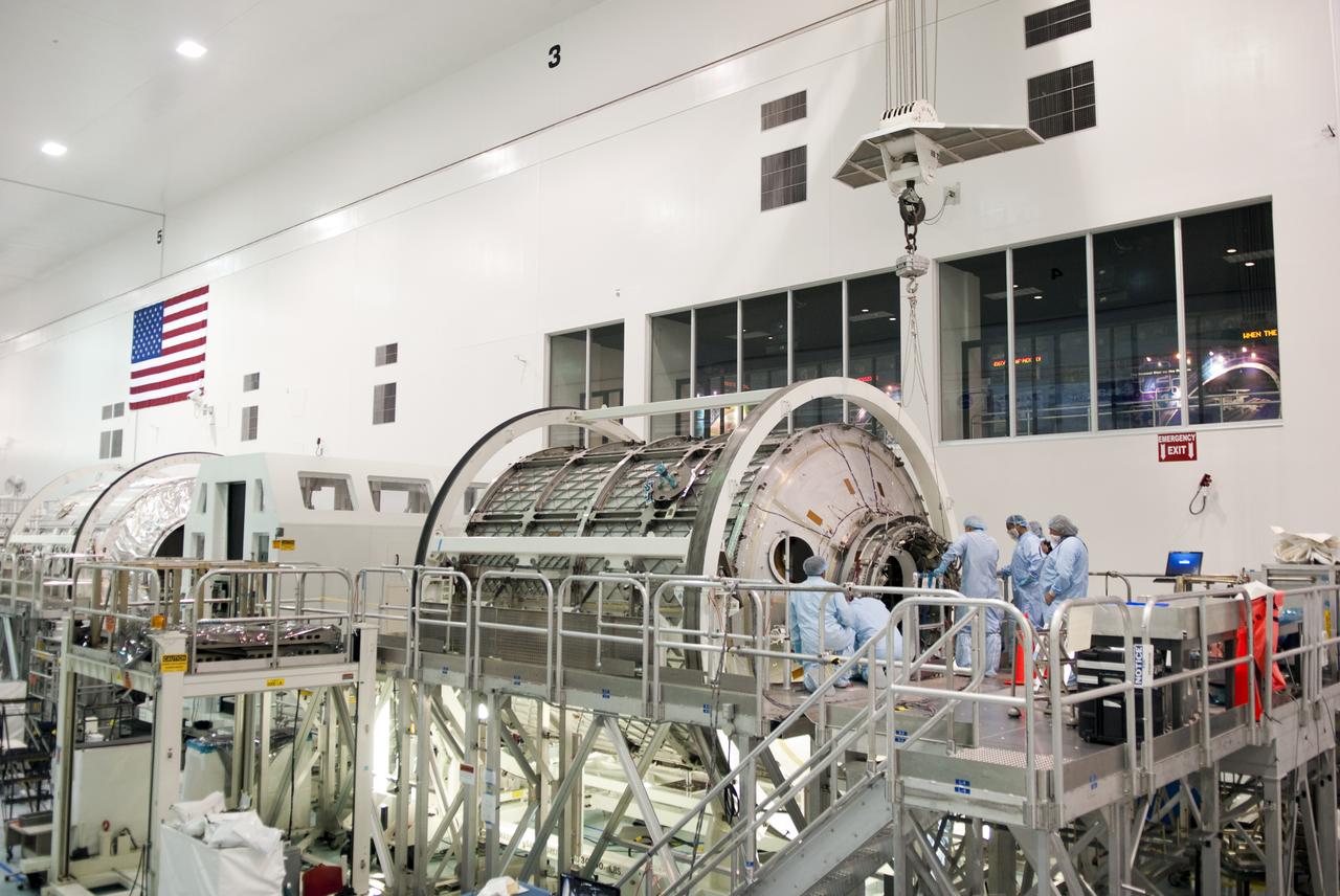 STS-133 COMMON BERTHING MECHANISIM (CMB) SIMULATOR HOIST & TEMPORARY INSTALL TO PERMANENT MULTIPURPOSE MODULE (PMM)