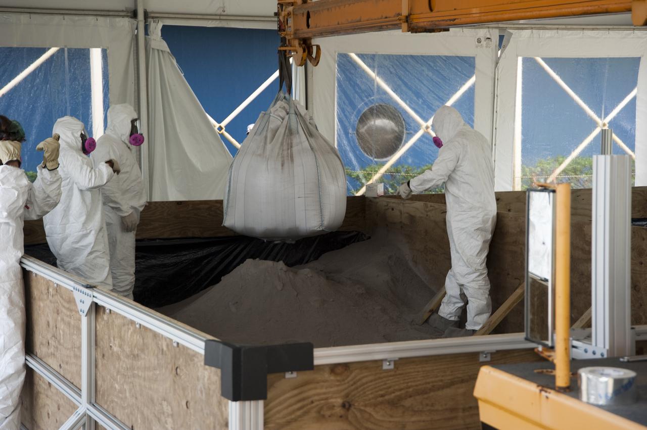 LUNABOTICS - SANDBOX BEING FILLED WITH SAND AT ASTRONAUT HALL OF FAME