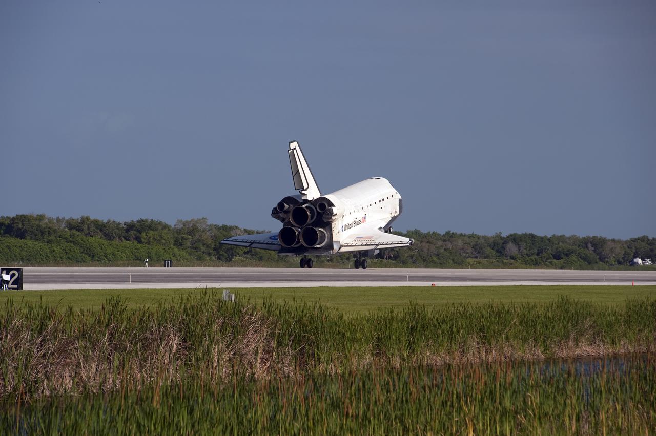 CAPE CANAVERAL, Fla. - Space shuttle Atlantis' main gear touches down on Runway 33 at the Shuttle Landing Facility at NASA's Kennedy Space Center in Florida. Landing was at 8:48 a.m. EDT, completing the 12-day STS-132 mission to the International Space Station. Main gear touchdown was at 8:48:11 a.m. EDT, followed by nose gear touchdown at 8:48:21 a.m. and wheelstop at 8:49:18 a.m. On board are Commander Ken Ham, Pilot Tony Antonelli, Mission Specialists Garrett Reisman, Michael Good, Steve Bowen and Piers Sellers.   The six-member STS-132 crew carried the Russian-built Mini Research Module-1 to the International Space Station. STS-132 is the 34th shuttle mission to the station, the 132nd shuttle mission overall and the last planned flight for Atlantis. For information on the STS-132 mission and crew, visit www.nasa.gov_mission_pages_shuttle_shuttlemissions_sts132_index.html. Photo credit: NASA_Ben Cooper
