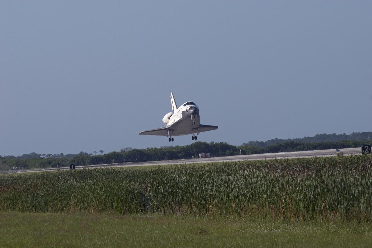 CAPE CANAVERAL, Fla. - Space shuttle Atlantis nears touchdown on Runway 33 at the Shuttle Landing Facility at NASA's Kennedy Space Center in Florida. Landing was at 8:48 a.m. EDT, completing the 12-day STS-132 mission to the International Space Station. Main gear touchdown was at 8:48:11 a.m. EDT, followed by nose gear touchdown at 8:48:21 a.m. and wheelstop at 8:49:18 a.m. On board are Commander Ken Ham, Pilot Tony Antonelli, Mission Specialists Garrett Reisman, Michael Good, Steve Bowen and Piers Sellers.   The six-member STS-132 crew carried the Russian-built Mini Research Module-1 to the International Space Station. STS-132 is the 34th shuttle mission to the station, the 132nd shuttle mission overall and the last planned flight for Atlantis. For information on the STS-132 mission and crew, visit www.nasa.gov_mission_pages_shuttle_shuttlemissions_sts132_index.html. Photo credit: NASA_Jim Grossmann