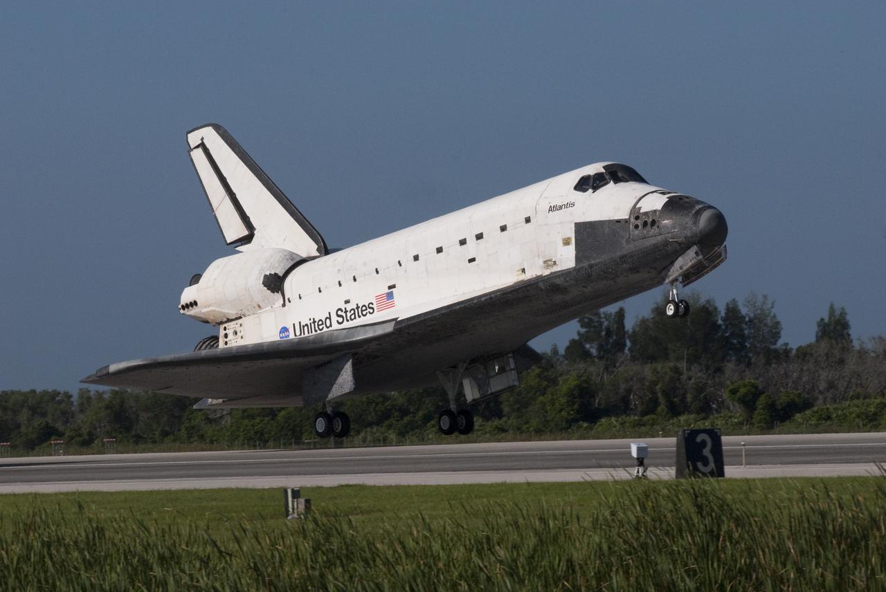 CAPE CANAVERAL, Fla. - Space shuttle Atlantis nears touchdown on Runway 33 at the Shuttle Landing Facility at NASA's Kennedy Space Center in Florida. Landing was at 8:48 a.m. EDT, completing the 12-day STS-132 mission to the International Space Station. Main gear touchdown was at 8:48:11 a.m. EDT, followed by nose gear touchdown at 8:48:21 a.m. and wheelstop at 8:49:18 a.m. On board are Commander Ken Ham, Pilot Tony Antonelli, Mission Specialists Garrett Reisman, Michael Good, Steve Bowen and Piers Sellers.   The six-member STS-132 crew carried the Russian-built Mini Research Module-1 to the International Space Station. STS-132 is the 34th shuttle mission to the station, the 132nd shuttle mission overall and the last planned flight for Atlantis. For information on the STS-132 mission and crew, visit www.nasa.gov_mission_pages_shuttle_shuttlemissions_sts132_index.html. Photo credit: NASA_Jim Grossmann