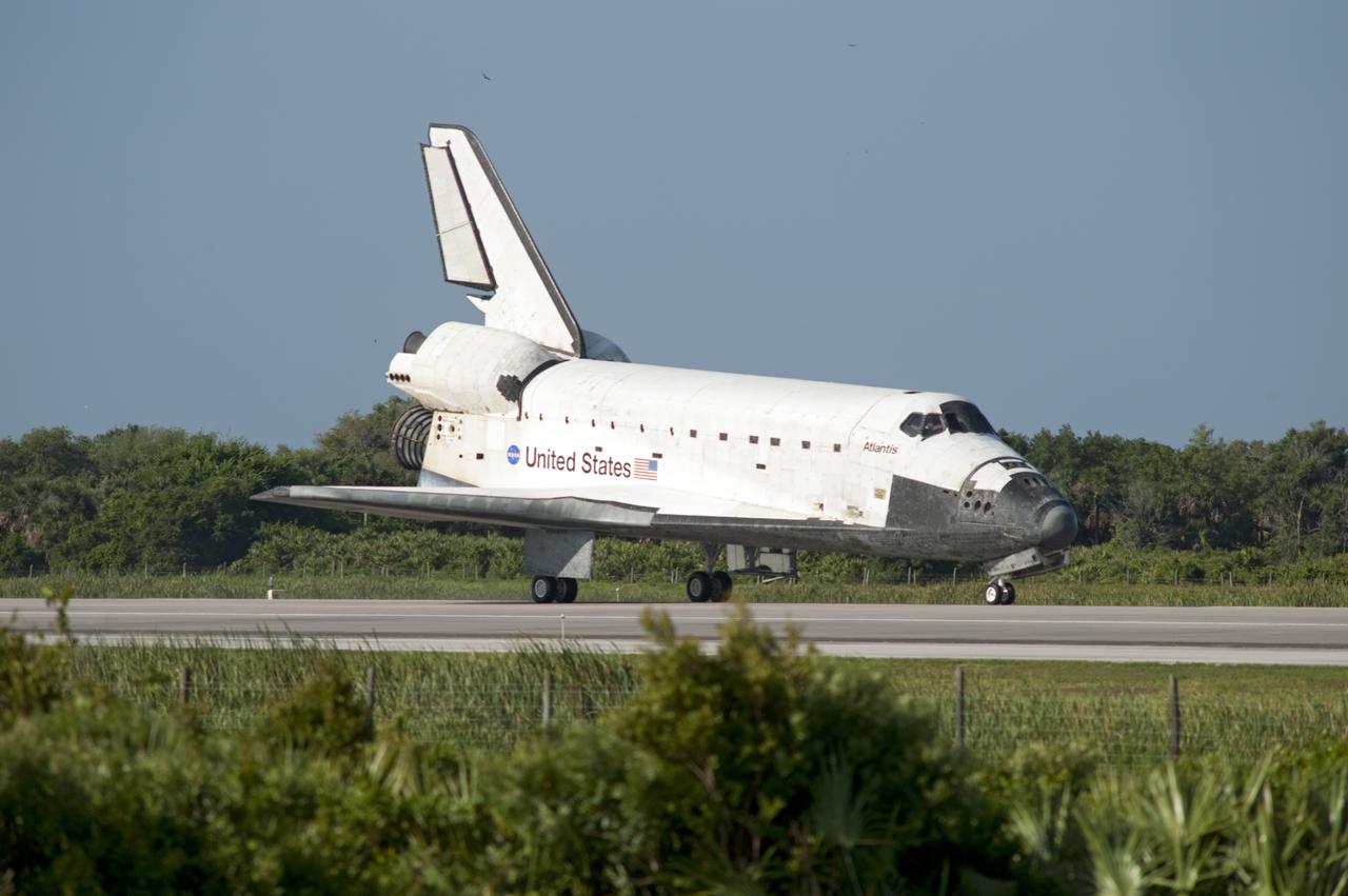 CAPE CANAVERAL, Fla. - Space shuttle Atlantis rolls to a stop on Runway 33 at the Shuttle Landing Facility at NASA's Kennedy Space Center in Florida. Landing was at 8:48 a.m. EDT, completing the 12-day STS-132 mission to the International Space Station. The six-member STS-132 crew carried the Russian-built Mini Research Module-1 to the International Space Station. STS-132 is the 34th shuttle mission to the station, the 132nd shuttle mission overall and the last planned flight for Atlantis. For information on the STS-132 mission and crew, visit www.nasa.gov_mission_pages_shuttle_shuttlemissions_sts132_index.html. Photo credit: NASA_Rusty Backer