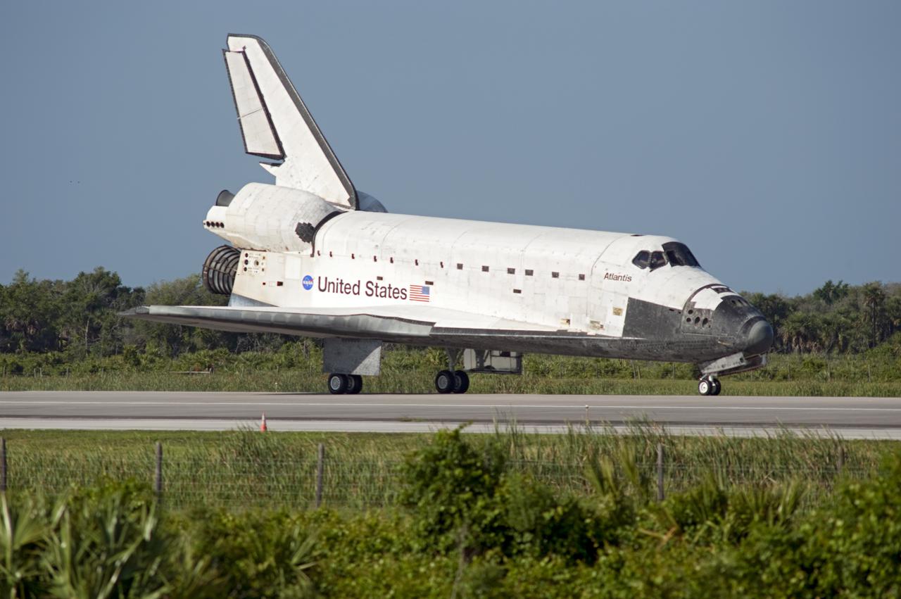 CAPE CANAVERAL, Fla. - Space shuttle Atlantis rolls to a stop on Runway 33 at the Shuttle Landing Facility at NASA's Kennedy Space Center in Florida. Landing was at 8:48 a.m. EDT, completing the 12-day STS-132 mission to the International Space Station. The six-member STS-132 crew carried the Russian-built Mini Research Module-1 to the International Space Station. STS-132 is the 34th shuttle mission to the station, the 132nd shuttle mission overall and the last planned flight for Atlantis. For information on the STS-132 mission and crew, visit www.nasa.gov_mission_pages_shuttle_shuttlemissions_sts132_index.html. Photo credit: NASA_Rusty Backer
