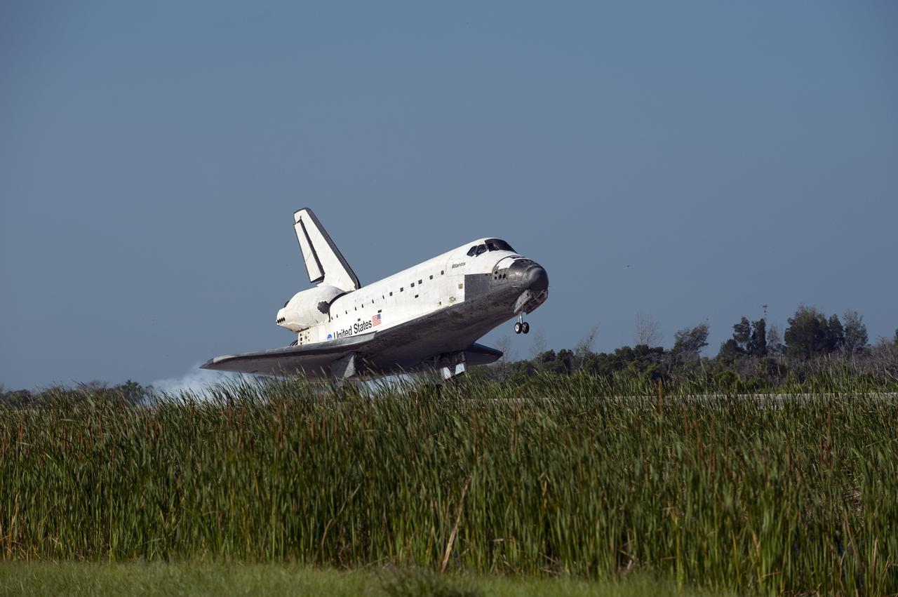 CAPE CANAVERAL, Fla. - Space shuttle Atlantis touches down on Runway 33 at the Shuttle Landing Facility at NASA's Kennedy Space Center in Florida. The shuttle approached from the southeast in a crystal-clear blue sky, giving the Space Coast quite a show. Landing was at 8:48 a.m. EDT, completing the 12-day STS-132 mission to the International Space Station. The six-member STS-132 crew carried the Russian-built Mini Research Module-1 to the space station. STS-132 is the 34th shuttle mission to the station, the 132nd shuttle mission overall and the last planned flight for Atlantis. For information on the STS-132 mission and crew, visit www.nasa.gov_mission_pages_shuttle_shuttlemissions_sts132_index.html. Photo credit: NASA_Kevin O'Connell