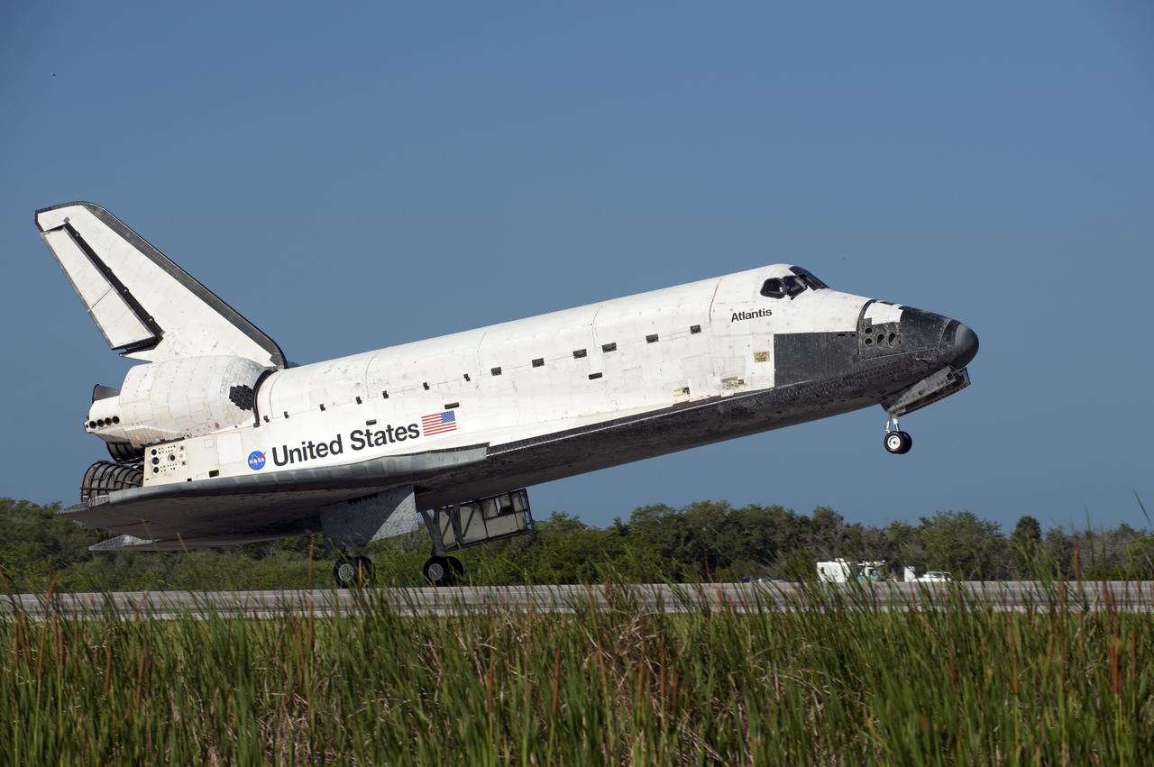 CAPE CANAVERAL, Fla. - Space shuttle Atlantis touches down on Runway 33 at the Shuttle Landing Facility at NASA's Kennedy Space Center in Florida. The shuttle approached from the southeast in a crystal-clear blue sky, giving the Space Coast quite a show. Landing was at 8:48 a.m. EDT, completing the 12-day STS-132 mission to the International Space Station. The six-member STS-132 crew carried the Russian-built Mini Research Module-1 to the space station. STS-132 is the 34th shuttle mission to the station, the 132nd shuttle mission overall and the last planned flight for Atlantis. For information on the STS-132 mission and crew, visit www.nasa.gov_mission_pages_shuttle_shuttlemissions_sts132_index.html. Photo credit: NASA_Kevin O'Connell