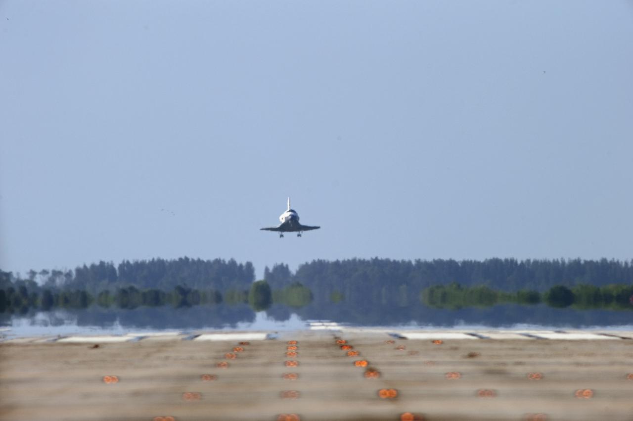 CAPE CANAVERAL, Fla. - Coming in from the southeast, space shuttle Atlantis approaches Runway 33 at the Shuttle Landing Facility at NASA's Kennedy Space Center in Florida. Landing was at 8:48 a.m. EDT, completing the 12-day STS-132 mission to the International Space Station. The six-member STS-132 crew carried the Russian-built Mini Research Module-1 to the space station. STS-132 is the 34th shuttle mission to the station, the 132nd shuttle mission overall and the last planned flight for Atlantis. For information on the STS-132 mission and crew, visit www.nasa.gov_mission_pages_shuttle_shuttlemissions_sts132_index.html. Photo credit: NASA_Sandra Joseph and Carl Winebarger