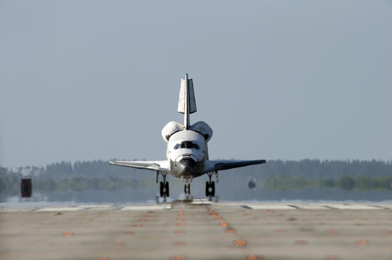 CAPE CANAVERAL, Fla. - Space shuttle Atlantis rolls down Runway 33 at the Shuttle Landing Facility at NASA's Kennedy Space Center in Florida. Landing was at 8:48 a.m. EDT, completing the 12-day STS-132 mission to the International Space Station. The six-member STS-132 crew carried the Russian-built Mini Research Module-1 to the space station. STS-132 is the 34th shuttle mission to the station, the 132nd shuttle mission overall and the last planned flight for Atlantis. For information on the STS-132 mission and crew, visit www.nasa.gov_mission_pages_shuttle_shuttlemissions_sts132_index.html. Photo credit: NASA_Sandra Joseph and Carl Winebarger