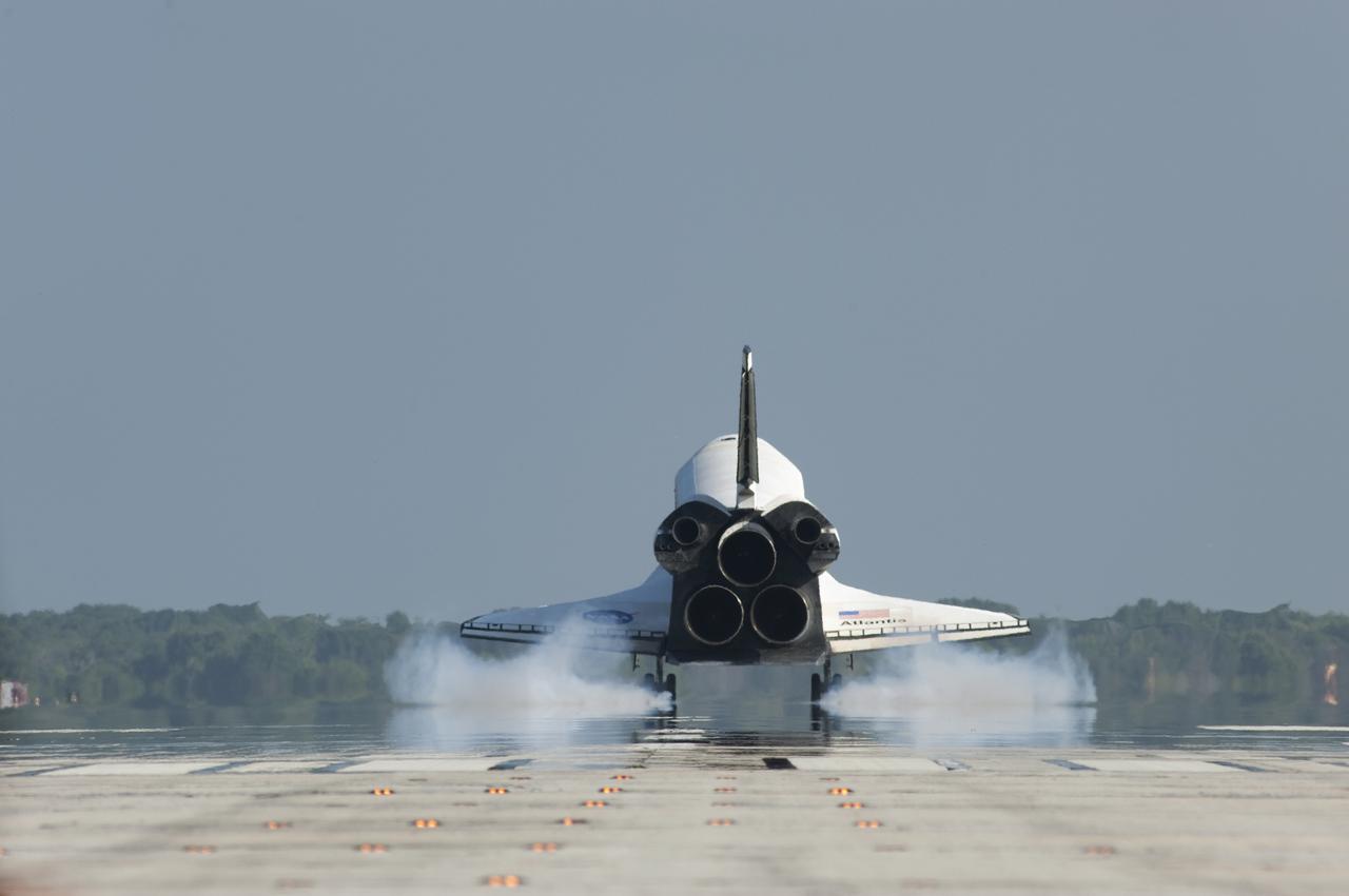 CAPE CANAVERAL, Fla. - Space shuttle Atlantis touches down on Runway 33 at the Shuttle Landing Facility at NASA's Kennedy Space Center in Florida. Landing was at 8:48 a.m. EDT, completing the 12-day STS-132 mission to the International Space Station. The six-member STS-132 crew carried the Russian-built Mini Research Module-1 to the space station. STS-132 is the 34th shuttle mission to the station, the 132nd shuttle mission overall and the last planned flight for Atlantis. For information on the STS-132 mission and crew, visit www.nasa.gov_mission_pages_shuttle_shuttlemissions_sts132_index.html. Photo credit: NASA_Tony Gray and Tom Farrar