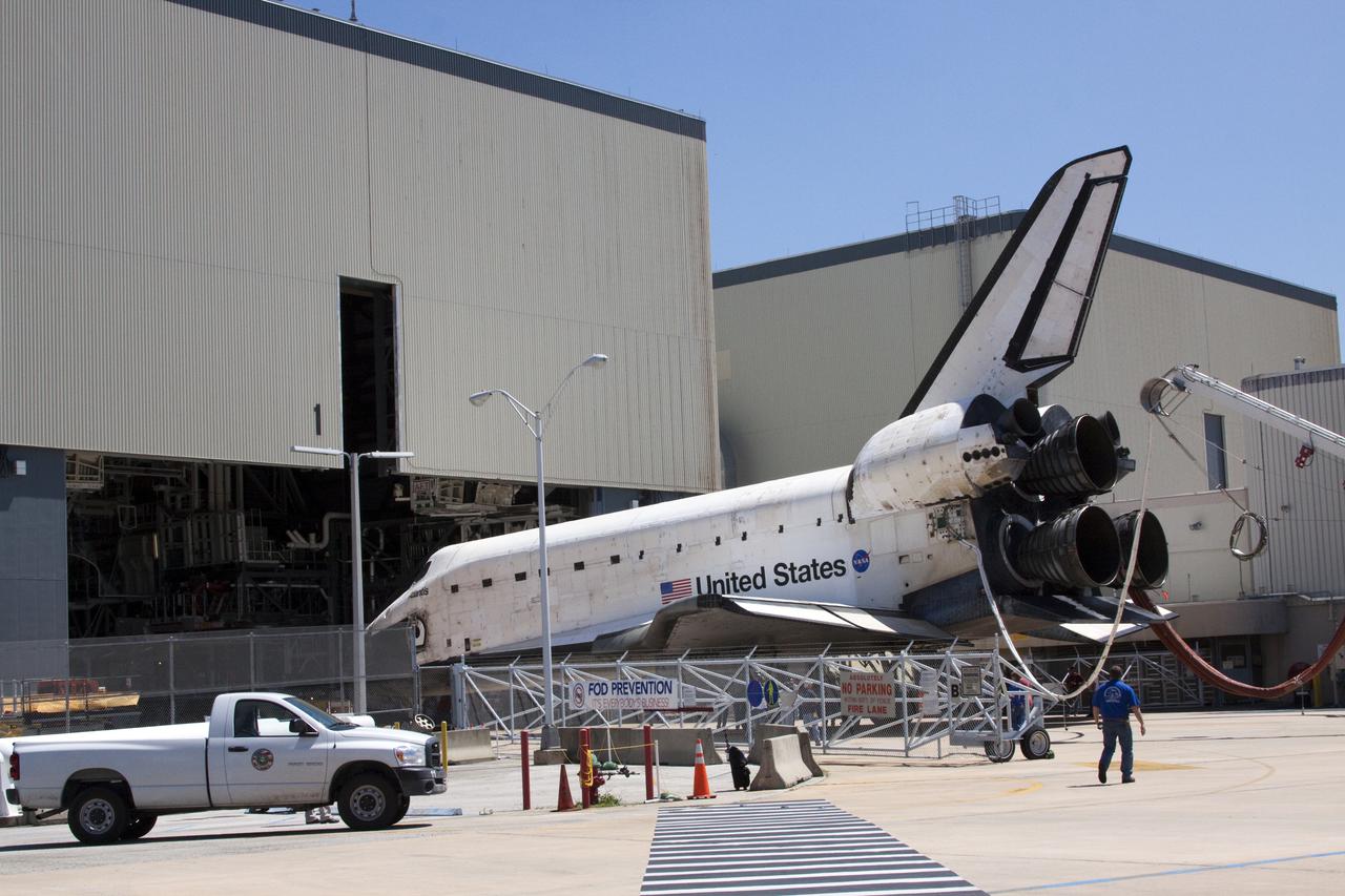 CAPE CANAVERAL, Fla. - At NASA's Kennedy Space Center in Florida, space shuttle Atlantis enters Orbiter Processing Facility-1, where it will be processed for the unlikely event it is needed as a rescue spacecraft for the final shuttle flight, Endeavour's STS-143 mission. Atlantis touched down on the Shuttle Landing Facility's Runway 33 after 12 days in space, completing the 4.8-million mile STS-132 mission to the International Space Station. The six-member STS-132 crew carried the Russian-built Mini Research Module-1 to the space station. STS-132 is the 34th shuttle mission to the station, the 132nd shuttle mission overall and the last planned flight for Atlantis. For information on the STS-132 mission and crew, visit www.nasa.gov_mission_pages_shuttle_shuttlemissions_sts132_index.html. Photo credit: NASA_Jack Pfaller