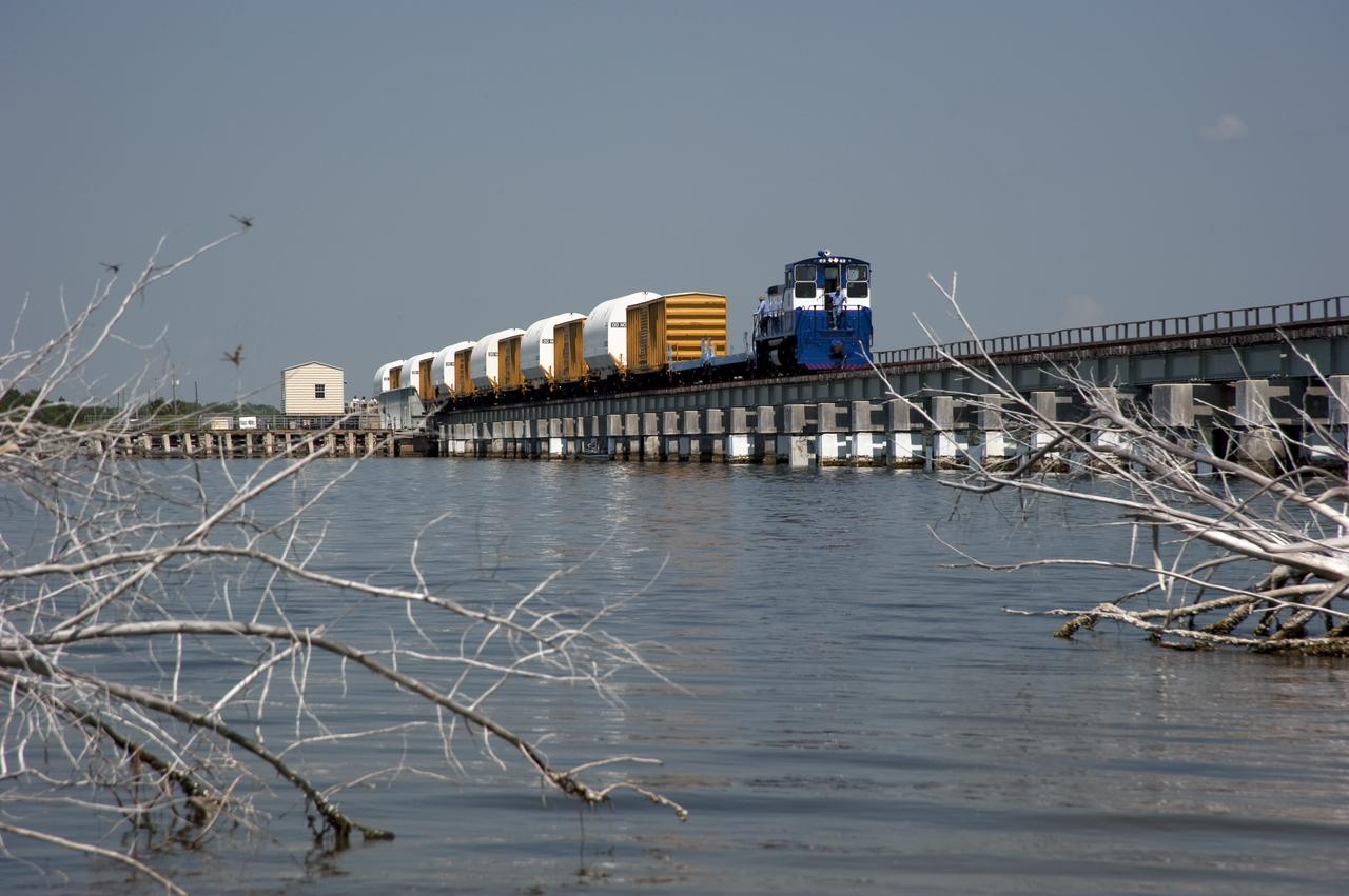 STS-335 LAUNCH ON NEED - LAST SRB SEGMENTS ARRIVAL - DRAW BRIDGE OVER BANANA RIVER