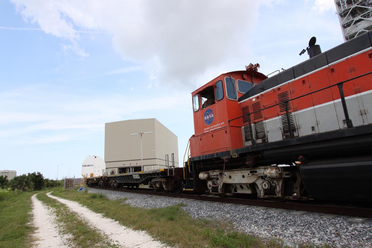 STS-335 Left Forward Segment on Train is Moved to RPSF