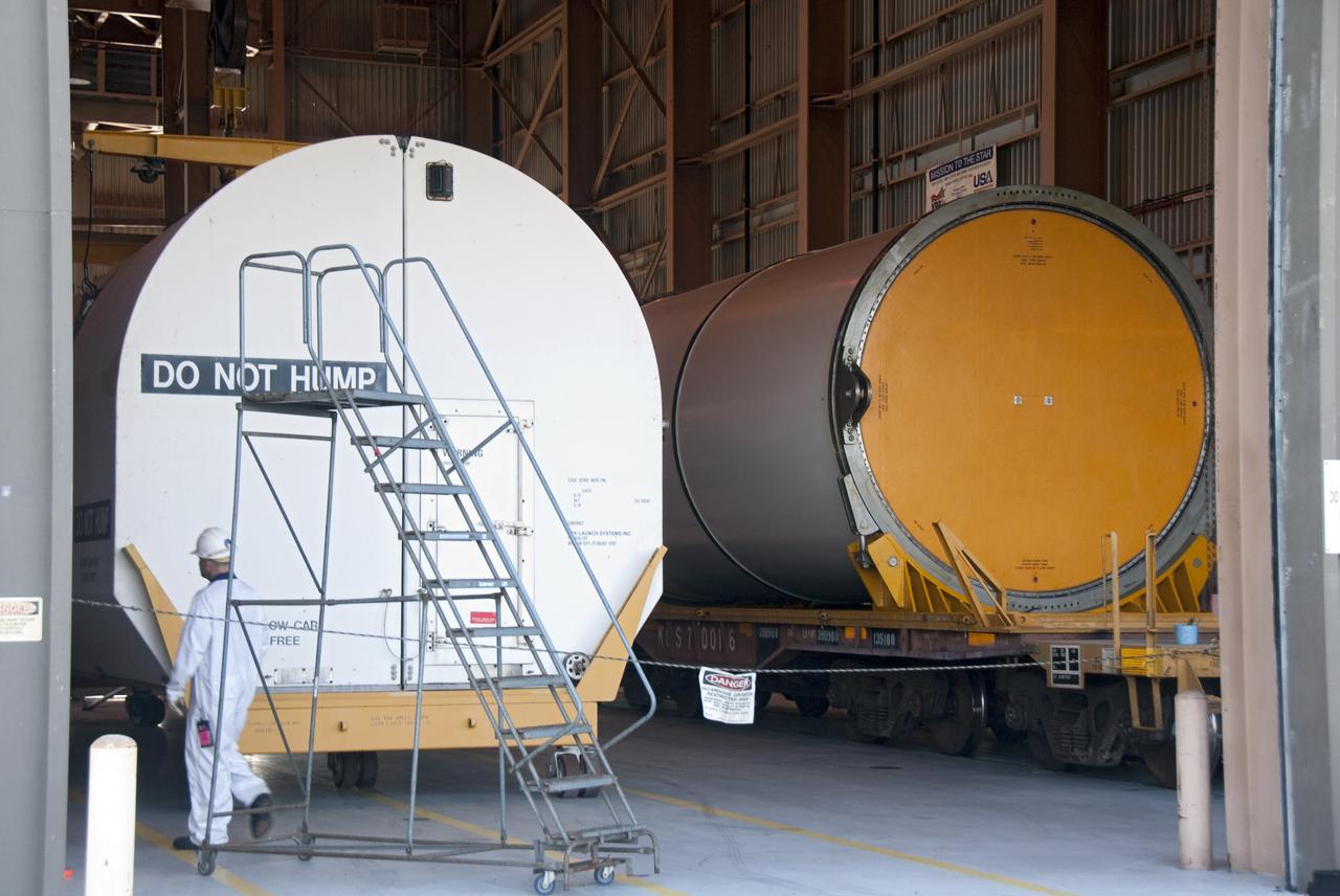 CAPE CANAVERAL, Fla. -- In the Rotation, Processing and Surge Facility, or RSPF, at NASA's Kennedy Space Center in Florida, workers prepare for the propellant grain inspection and truing of the final solid rocket booster segments, which is a required safety analysis. The booster segments were manufactured at the ATK solid rocket booster plant in Promontory, Utah, and traveled to Kennedy along the Florida East Coast Railway.  The booster segments will be stacked and then mated to space shuttle Atlantis and its external fuel tank in the Vehicle Assembly Building. The segments will be used for what currently is planned as the 'launch on need,' or potential rescue mission for the final shuttle flight, Endeavour's STS-134 mission. For information, visit www.nasa.gov_shuttle. Photo credit: NASA_Cory Huston