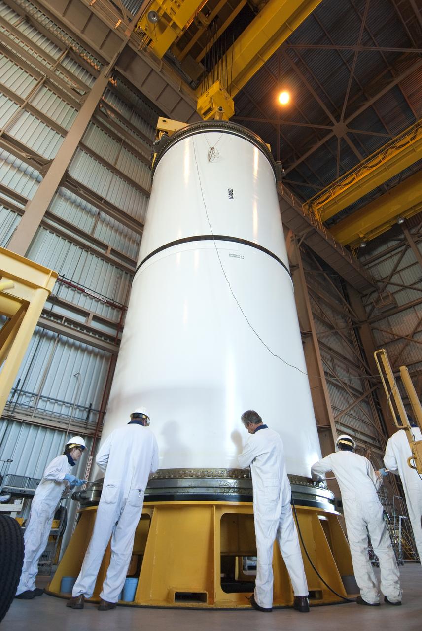 STS-335 LAUNCH ON NEED - SEGMENT LIFT TO VERTICAL AND MOVE TO WORKSTAND