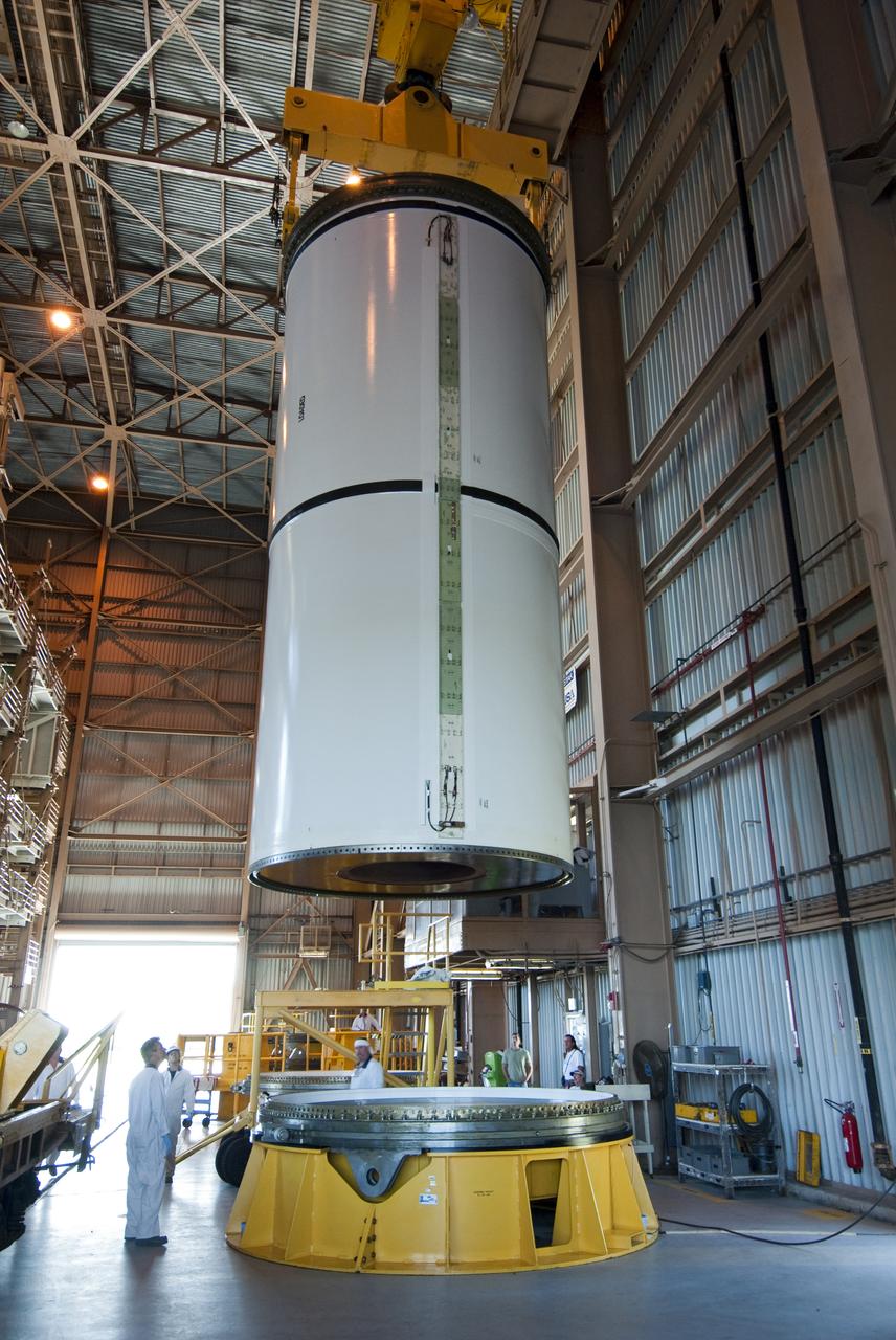 STS-335 LAUNCH ON NEED - SEGMENT LIFT TO VERTICAL AND MOVE TO WORKSTAND