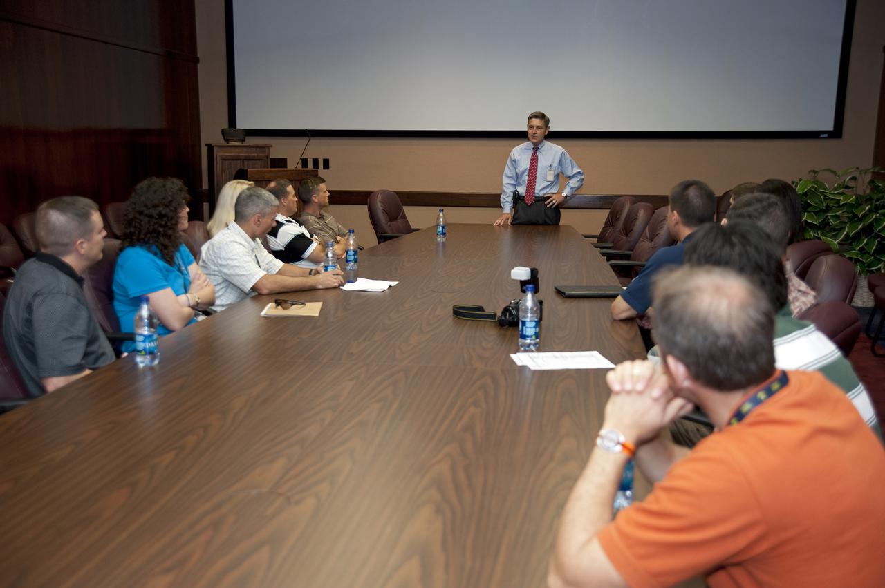 CAPE CANAVERAL, Fla. -- At NASA's Kennedy Space Center in Florida, four-time shuttle astronaut and Kennedy Center Director Bob Cabana meets the Class of 2009 Astronaut Candidates, also called ASCANs.   The new astronaut candidates for NASA are Serena M. Aunon, Jeanette J. Epps, Air Force Maj. Jack D. Fischer, Air Force Lt. Col. Michael S. Hopkins, Kjell N. Lindgren, Kathleen 'Kate' Rubins, Navy Cmdr. Scott D. Tingle, Army Lt. Col. Mark T. Vande, and Navy Lt. Cmdr. Gregory R. 'Reid' Wiseman. The new astronaut candidates for the Japan Aerospace Exploration Agency, or JAXA, are Norishige Kanai, Takuya Onishi and Kimiya Yui. The new astronaut candidates for the Canadian Space Agency, or CSA, are Jeremy Hansen and David Saint-Jacques. Photo Credit: NASA_Kim Shiflett