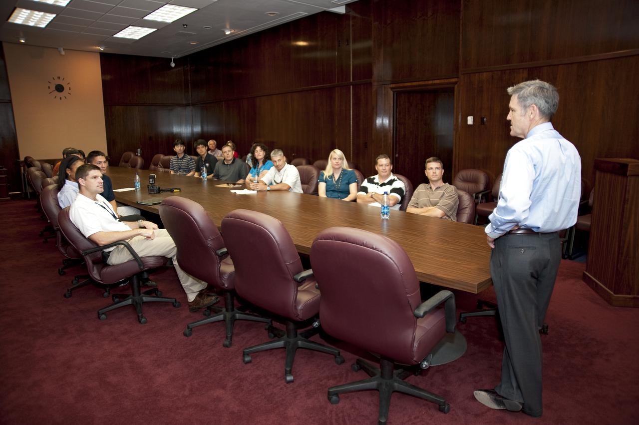 CAPE CANAVERAL, Fla. --- At NASA's Kennedy Space Center in Florida, four-time shuttle astronaut and Kennedy Center Director Bob Cabana meets the Class of 2009 Astronaut Candidates, also called ASCANs.  The new astronaut candidates for NASA are Serena M. Aunon, Jeanette J. Epps, Air Force Maj. Jack D. Fischer, Air Force Lt. Col. Michael S. Hopkins, Kjell N. Lindgren, Kathleen 'Kate' Rubins, Navy Cmdr. Scott D. Tingle, Army Lt. Col. Mark T. Vande, and Navy Lt. Cmdr. Gregory R. 'Reid' Wiseman. The new astronaut candidates for the Japan Aerospace Exploration Agency, or JAXA, are Norishige Kanai, Takuya Onishi and Kimiya Yui. The new astronaut candidates for the Canadian Space Agency, or CSA, are Jeremy Hansen and David Saint-Jacques.  Photo Credit: NASA_Kim Shiflett