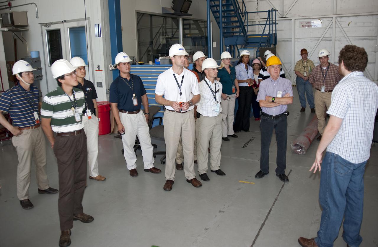 CAPE CANAVERAL, Fla. --- At NASA's Kennedy Space Center in Florida, the Class of 2009 Astronaut Candidates, also called ASCANs, tour the Launch Equipment Test Facility, where prototype ground support equipment is tested. The new astronaut candidates for NASA are Serena M. Aunon, Jeanette J. Epps, Air Force Maj. Jack D. Fischer, Air Force Lt. Col. Michael S. Hopkins, Kjell N. Lindgren, Kathleen 'Kate' Rubins, Navy Cmdr. Scott D. Tingle, Army Lt. Col. Mark T. Vande, and Navy Lt. Cmdr. Gregory R. 'Reid' Wiseman. The new astronaut candidates for the Japan Aerospace Exploration Agency, or JAXA, are Norishige Kanai, Takuya Onishi and Kimiya Yui. The new astronaut candidates for the Canadian Space Agency, or CSA, are Jeremy Hansen and David Saint-Jacques. Photo Credit: NASA_Kim Shiflett