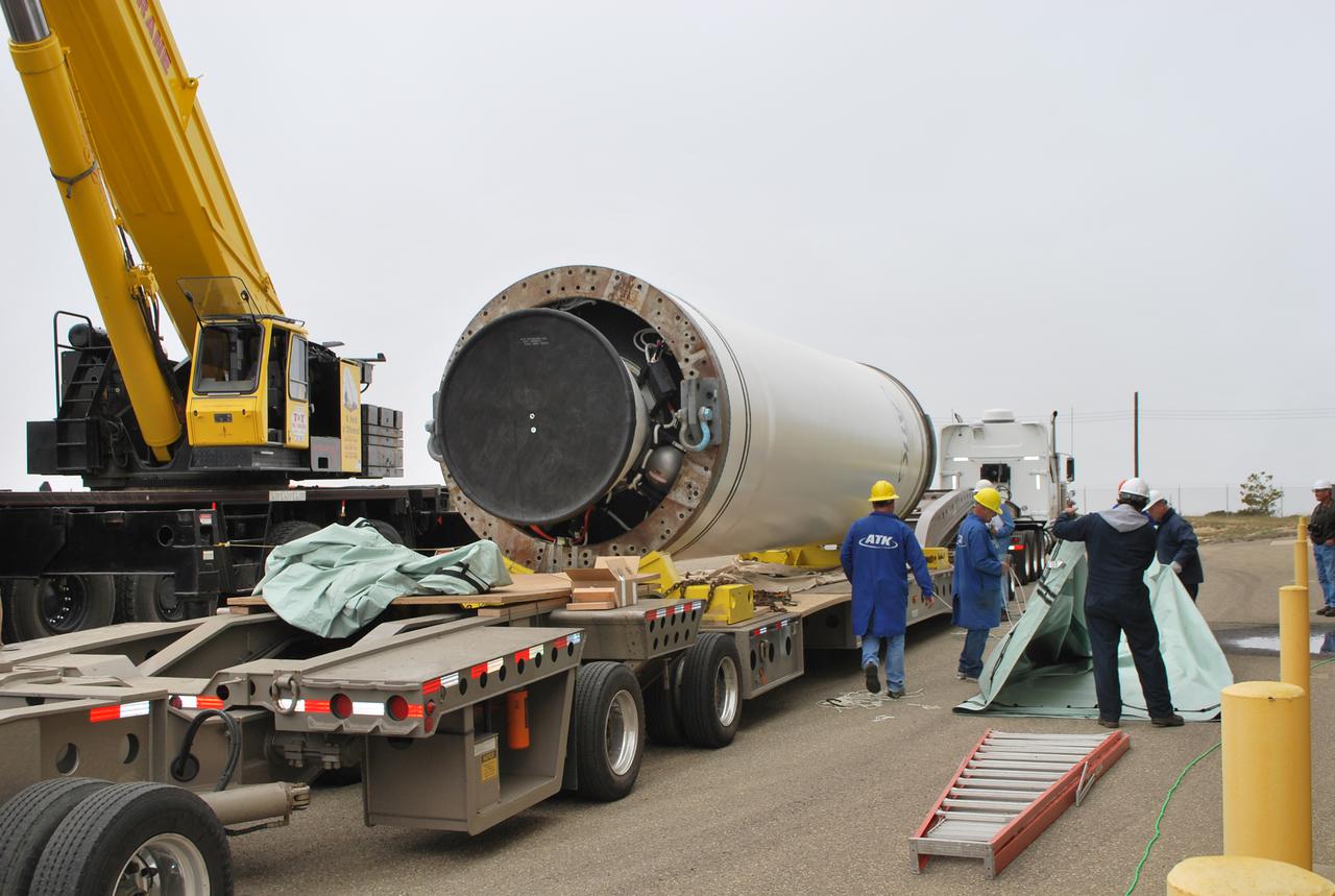 VANDENBERG AIR FORCE BASE, Calif. -- At Vandenberg Air Force Base in California, the Stage 0 motor for the Taurus XL launch vehicle is prepared for transportation into Orbital Sciences' Hangar 1555. The motor will help carry NASA's Glory satellite into low Earth orbit.    Glory is scheduled to launch in November from Vandenberg's Launch Pad SLC 576-E. Once Glory reaches orbit, it will collect data on the properties of aerosols and black carbon. It also will help scientists understand how the sun's irradiance affects Earth's climate.  Photo credit: NASA_Randy Beaudoin, VAFB