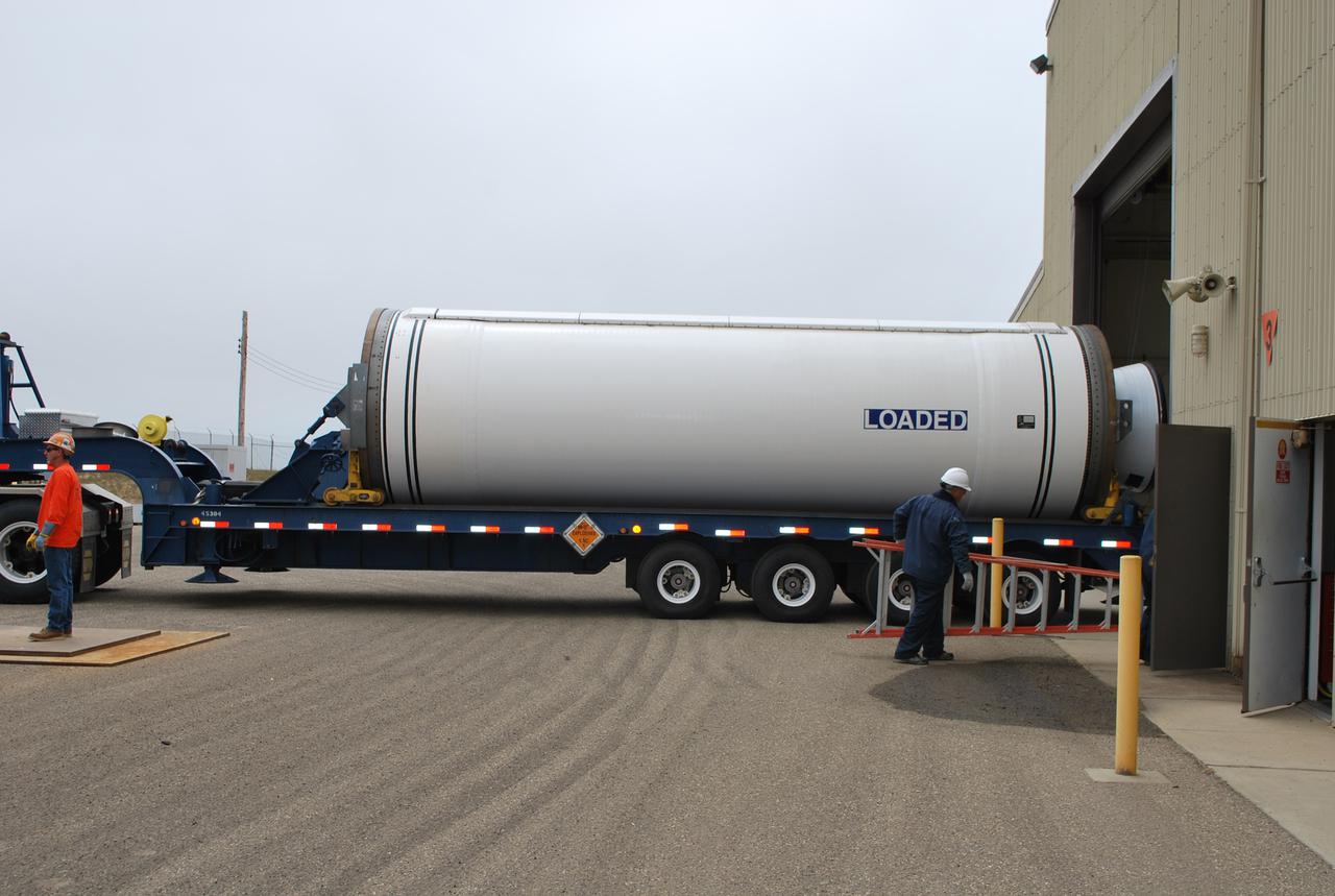 VANDENBERG AIR FORCE BASE, Calif. -- At Vandenberg Air Force Base in California, the Stage 0 motor for the Taurus XL launch vehicle is moved into Orbital Sciences' Hangar 1555. The motor will help lift NASA's Glory satellite into low Earth orbit.     Glory is scheduled to launch in November from Vandenberg's Launch Pad SLC 576-E. Once Glory reaches orbit, it will collect data on the properties of aerosols and black carbon. It also will help scientists understand how the sun's irradiance affects Earth's climate.  Photo credit: NASA_Randy Beaudoin, VAFB