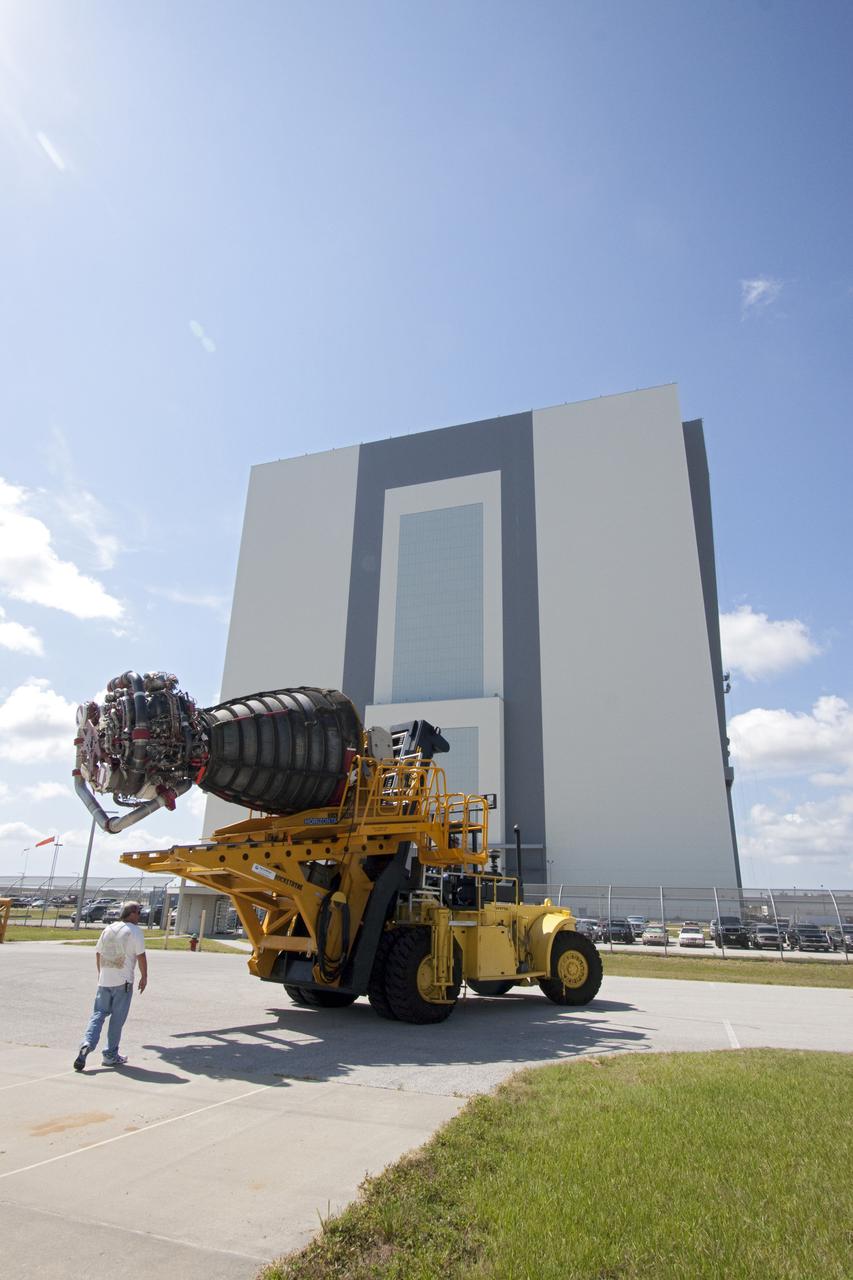 CAPE CANAVERAL, Fla. -- At NASA's Kennedy Space Center in Florida, a space shuttle main engine secured on a Hyster forklift moves from the Space Shuttle Main Engine Processing Facility to Orbiter Processing Facility-3. Three main engines, weighing 7,000 pounds each, will be installed in space shuttle Discovery for the STS-133 mission to the International Space Station. Discovery and its STS-133 crew are targeted to deliver the Express Logistics Carrier-4 filled with external payloads and experiments, as well as critical spare components to the station later this year. Photo credit: NASA_Jack Pfaller