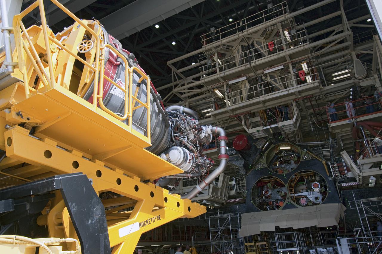 CAPE CANAVERAL, Fla. -- At NASA's Kennedy Space Center in Florida, a space shuttle main engine secured on a Hyster forklift is ready to be installed to space shuttle Discovery in Orbiter Processing Facility-3. Three main engines, weighing 7,000 pounds each, will be installed in the shuttle for the STS-133 mission to the International Space Station. Engines are inspected and maintained in the nearby Space Shuttle Main Engine Processing Facility before installation. Discovery and its STS-133 crew are targeted to deliver the Express Logistics Carrier-4 filled with external payloads and experiments, as well as critical spare components to the station later this year. Photo credit: NASA_Jack Pfaller