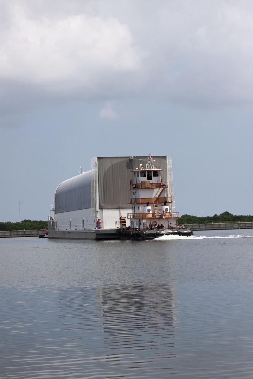 CAPE CANAVERAL, Fla. -- Tugboats safely deliver NASA's Pegasus barge, carrying External Tank-138 to the turn basin at NASA's Kennedy Space Center in Florida. ET-138, the last newly manufactured tank, was originally designated to fly on Endeavour's STS-134 mission to the International Space Station, but later reassigned to fly on space shuttle Atlantis' final mission, STS-135. For information, visit www.nasa.gov_shuttle. Photo credit: NASA_Jack Pfaller