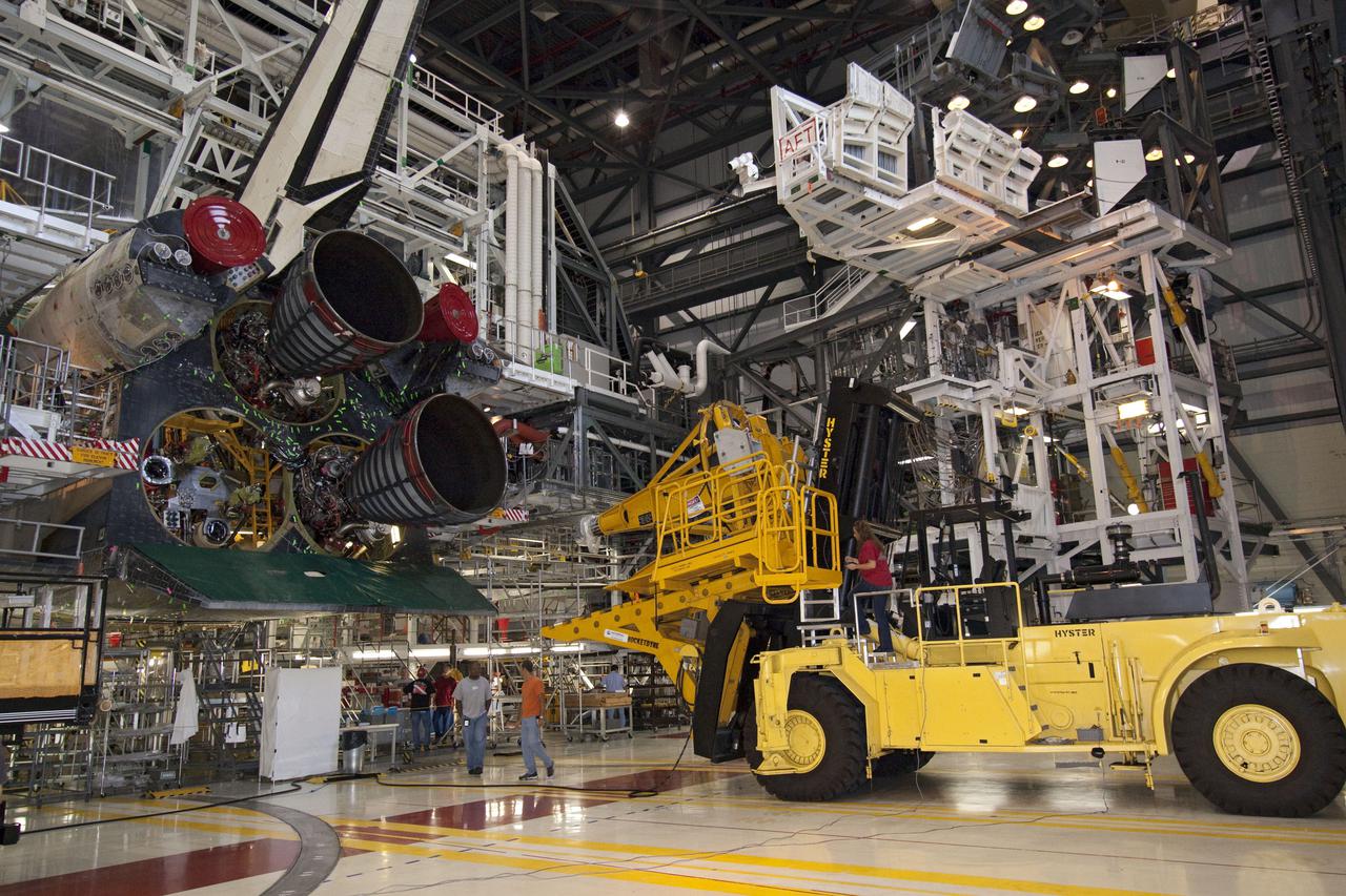 CAPE CANAVERAL, Fla. -- In Orbiter Processing Facility-1 at NASA's Kennedy Space Center in Florida, removal of main engine no. 3 from space shuttle Atlantis is under way.       Inspection and maintenance of each main engine is standard procedure following a shuttle mission. Some of the engines maintained and stored in the engine shop could be used for Atlantis, on what currently is planned as the 'launch on need,' or potential rescue mission for Endeavour's STS-134 mission, targeted for launch Feb. 26, 2011. For information, visit www.nasa.gov_shuttle. Photo credit: NASA_Jack Pfaller