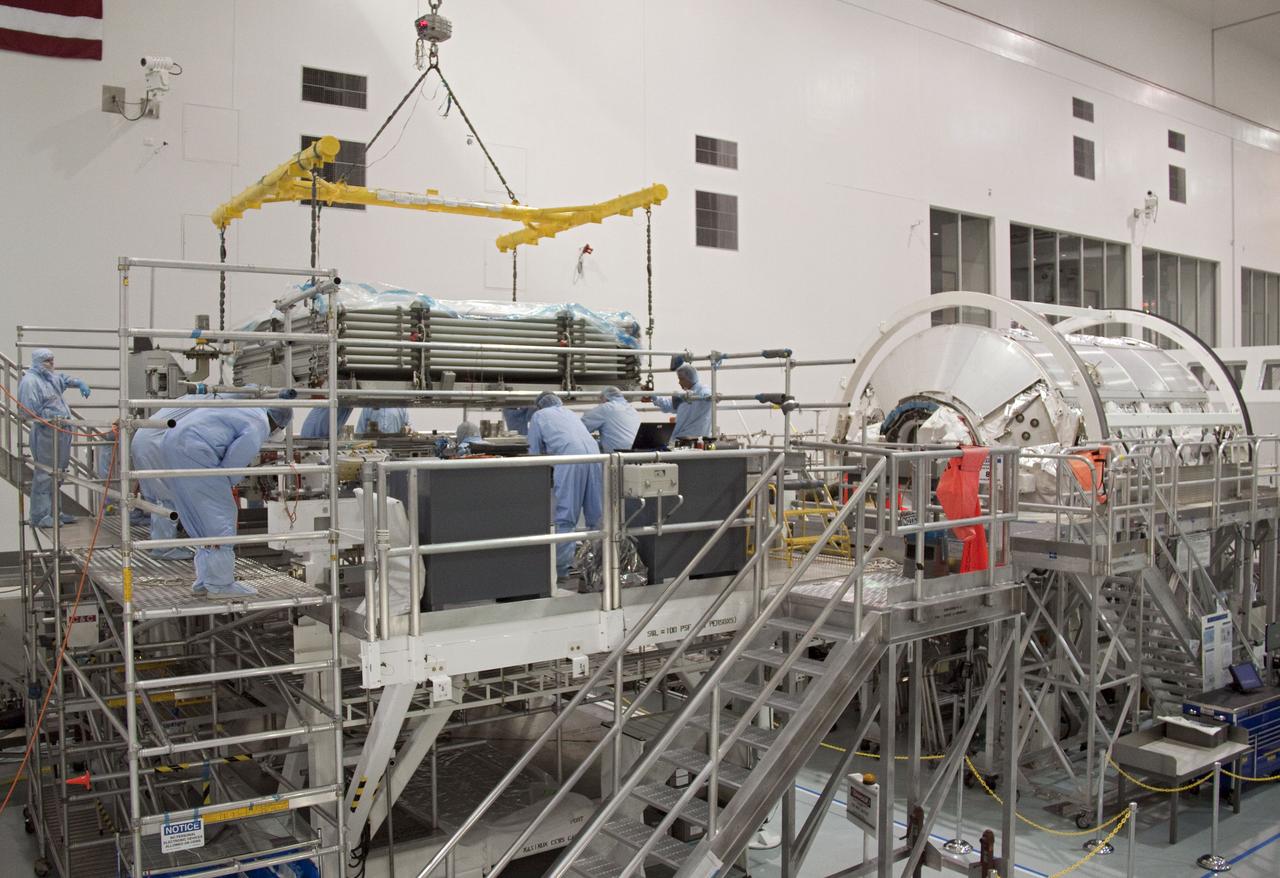 STS-133 HRS INSTALLATION TO PMM