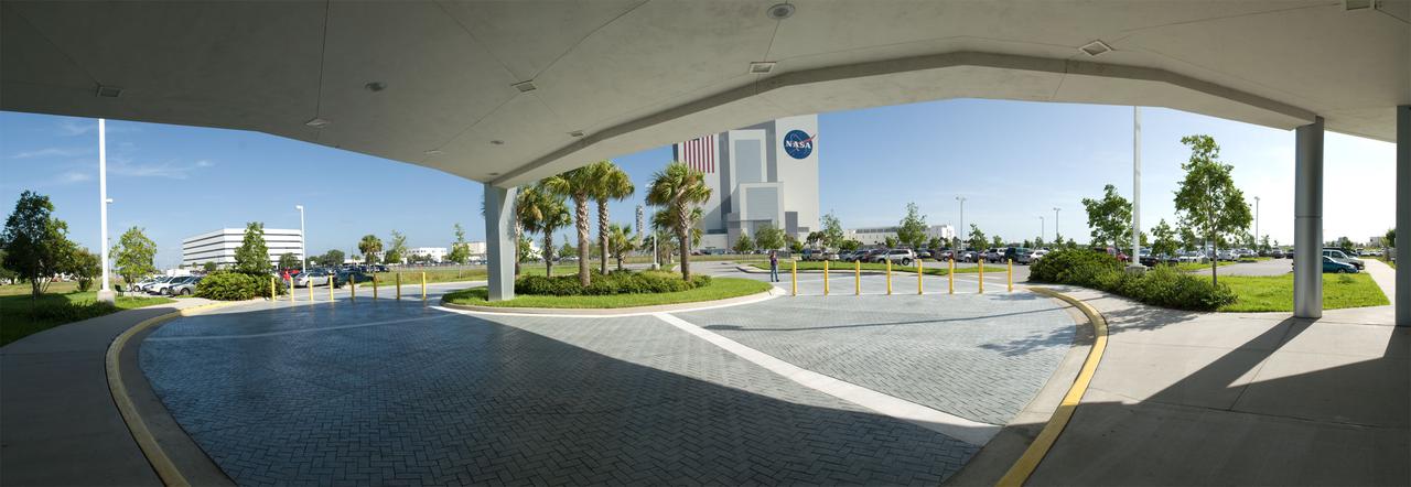 CAPE CANAVERAL, Fla. -- The panoramic view of the Vehicle Assembly Building, or VAB, at NASA's Kennedy Space Center in Florida is taken from under the porte cochere of the Operations Support Building, or OSB, II located in the Launch Complex 39 area. OSB I also is seen towards to the left of the VAB. To the right of the VAB in the distance, is the 4-story Launch Control Center. Photo credit: NASA_Frankie Martin