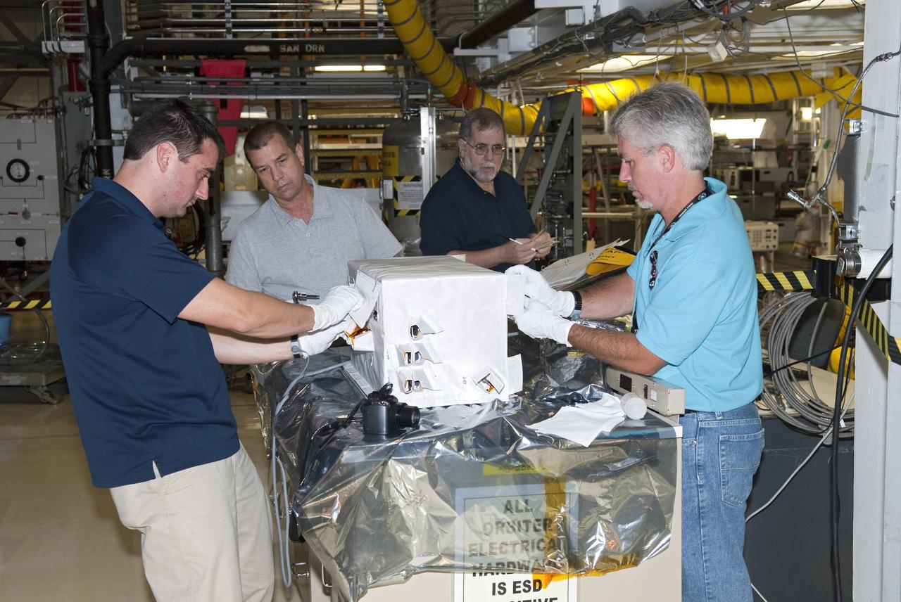 STS-134 ENDEAVOUR STORRM INSTLN FORWARD CARGO BAY FOR "BALL" ORION PROJECT - DOCKING EXPERIMENT - LARK