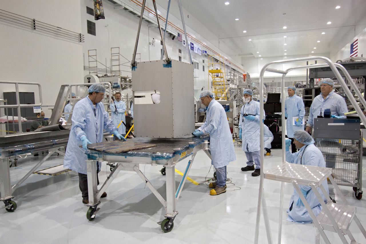 STS-133 R2 ROBONAUT HOIST TO HORIZONTAL