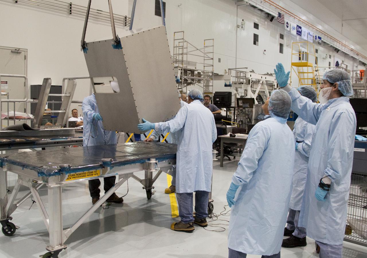 STS-133 R2 ROBONAUT HOIST TO HORIZONTAL