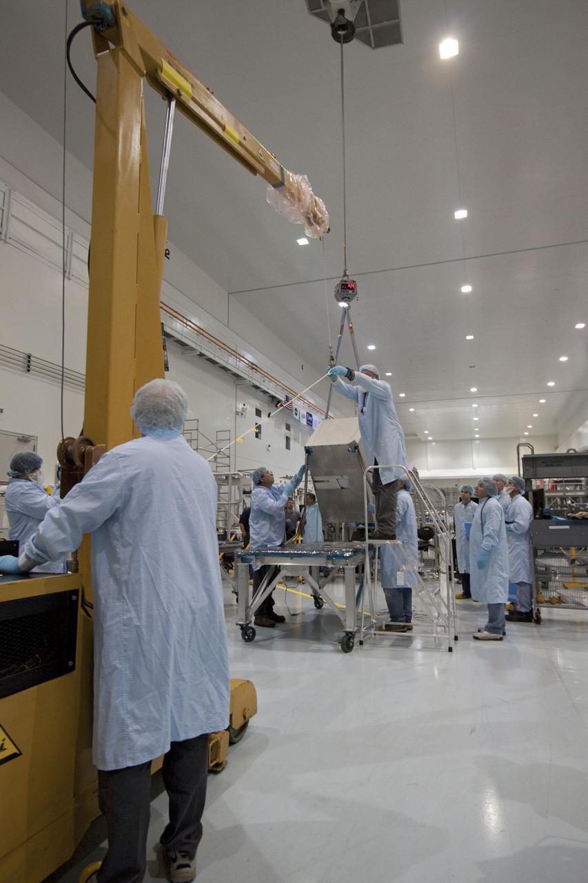 STS-133 R2 ROBONAUT HOIST TO HORIZONTAL