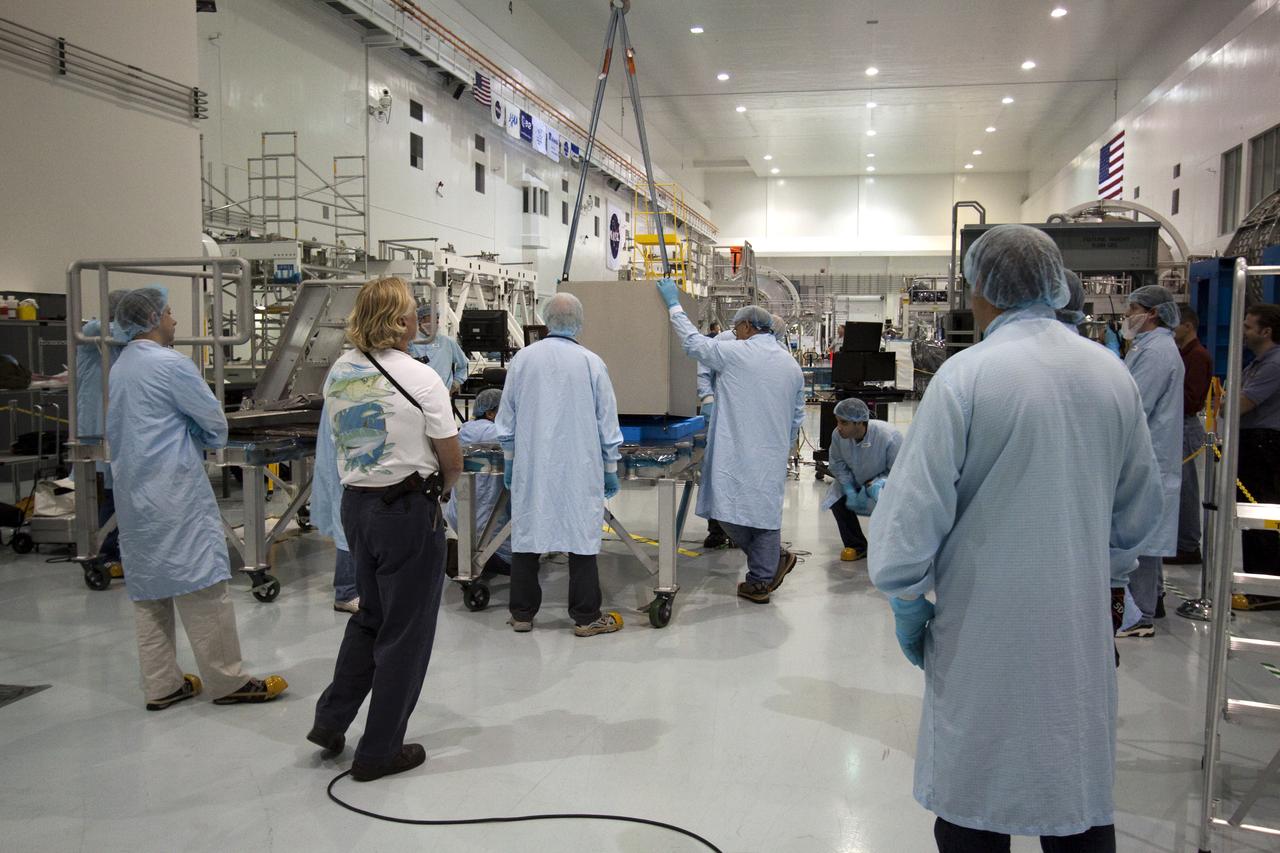 STS-133 R2 ROBONAUT HOIST TO HORIZONTAL