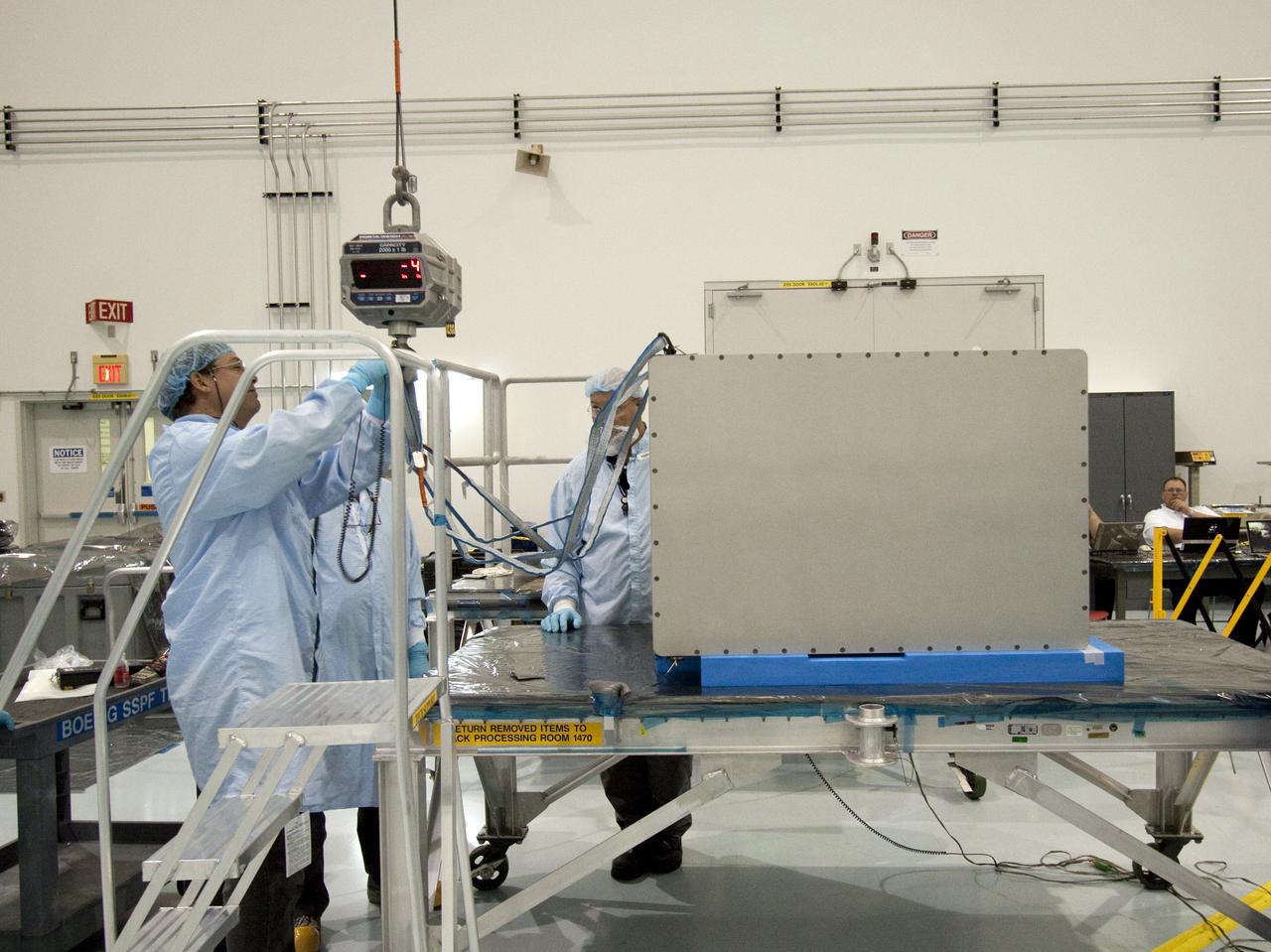 STS-133 R2 ROBONAUT HOIST TO HORIZONTAL