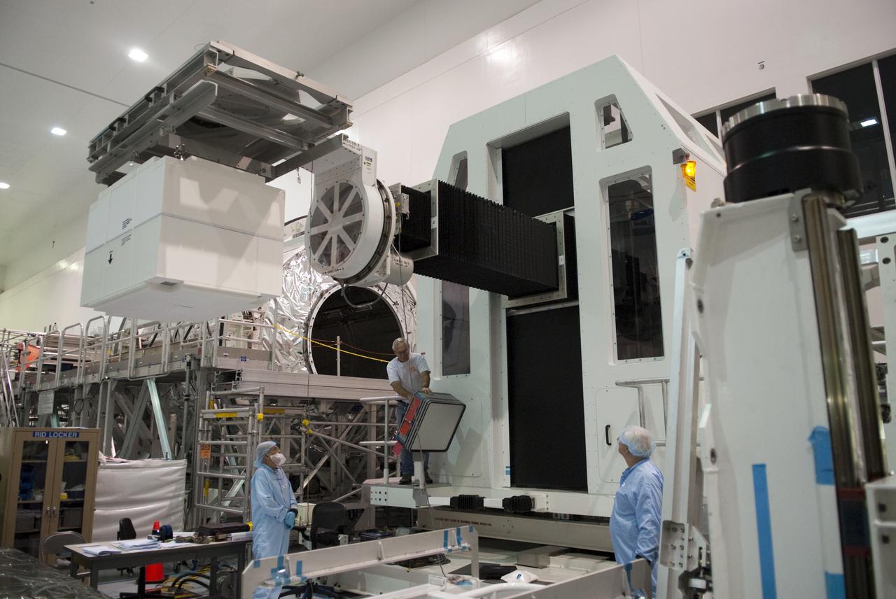 STS-133 R2 ROBONAUT CONTAINER LIFT TO PMM