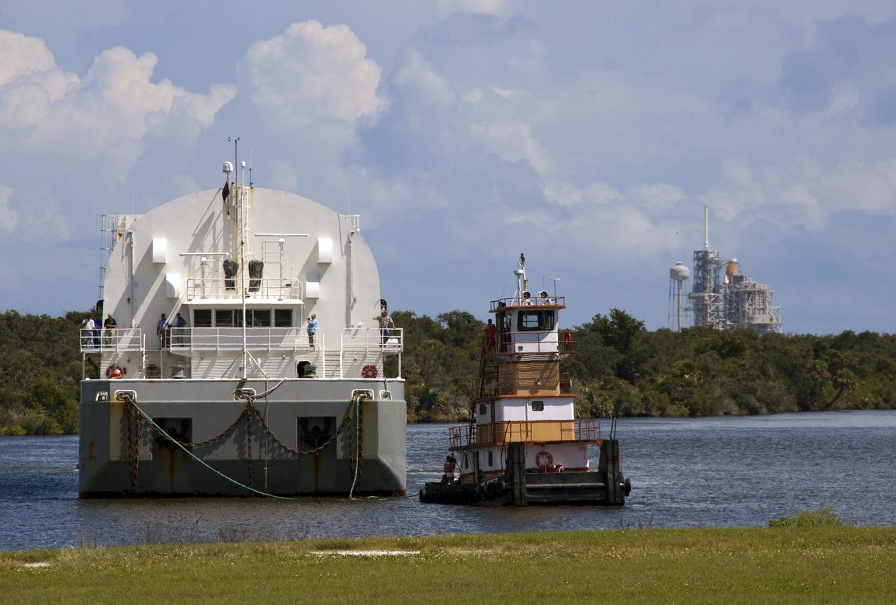 STS-335 LAUNCH ON NEED - ET-122 ARRIVES AT LC39 TURN BASIN