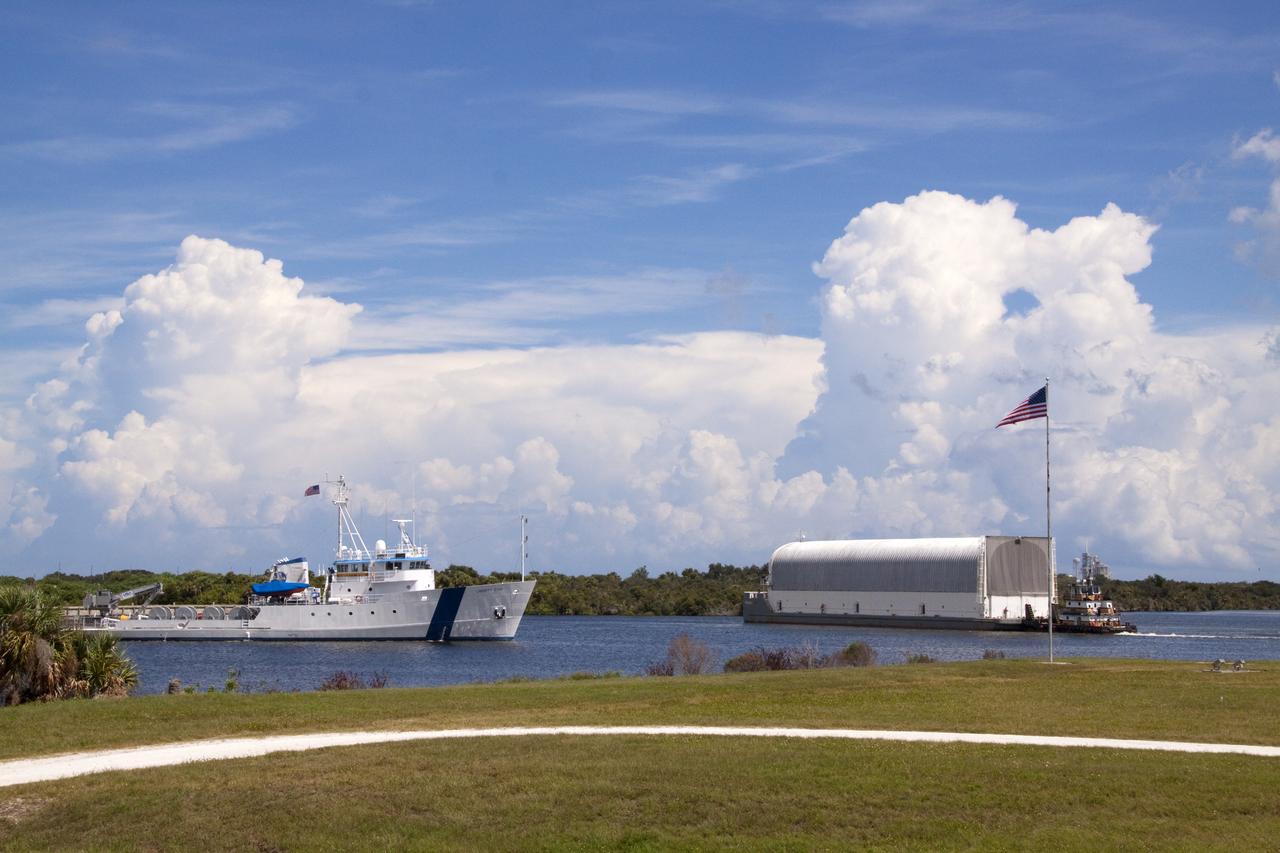 STS-335 LAUNCH ON NEED - ET-122 ARRIVES AT LC39 TURN BASIN