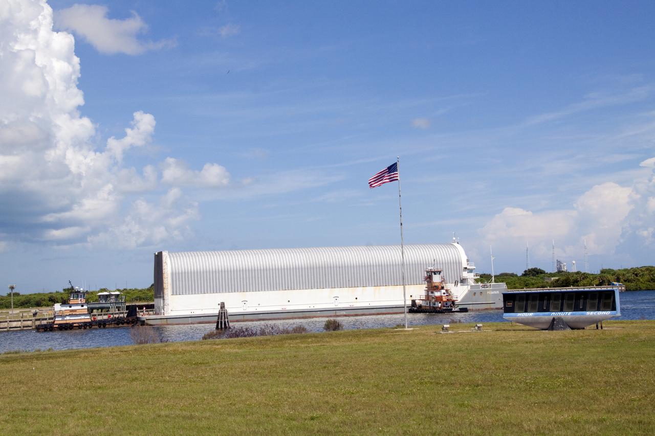STS-335 LAUNCH ON NEED - ET-122 ARRIVES AT LC39 TURN BASIN