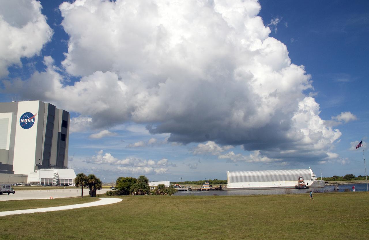 STS-335 LAUNCH ON NEED - ET-122 ARRIVES AT LC39 TURN BASIN