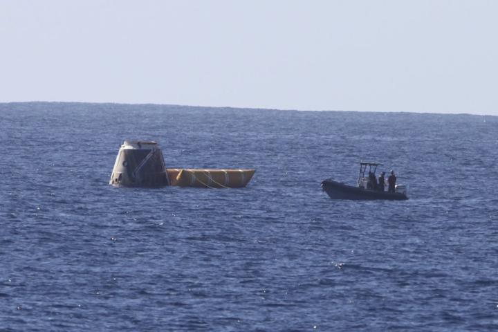 The Dragon capsule that launched from Launch Complex-40 at Cape Canaveral Air Force Station aboard a SpaceX Falcon 9 rocket is recovered in the Pacific Ocean about 500 miles west of the coast of Mexico. The rocket lifted off at 10:43 a.m. EST. The spacecraft went through several maneuvers before it re-entered the atmosphere and splashed down at about 2 p.m. EST. This is first demonstration flight for NASA's Commercial Orbital Transportation Services (COTS) program, which will provide cargo flights to the International Space Station in the future. Photo credit: Courtesy SpaceX  