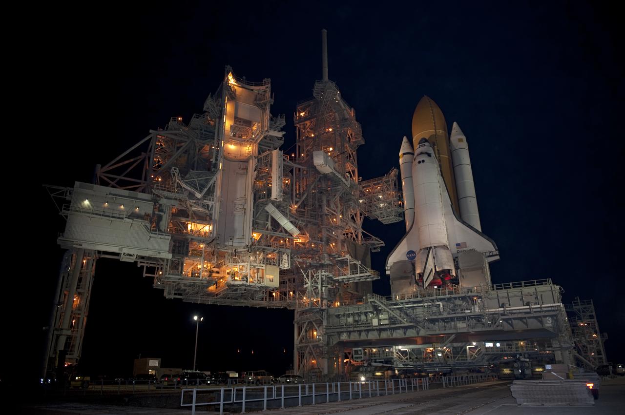 STS-133 Discovery on Pad 39A with Winter Solstice Moon Eclipse - scrubbed Rollback to VAB