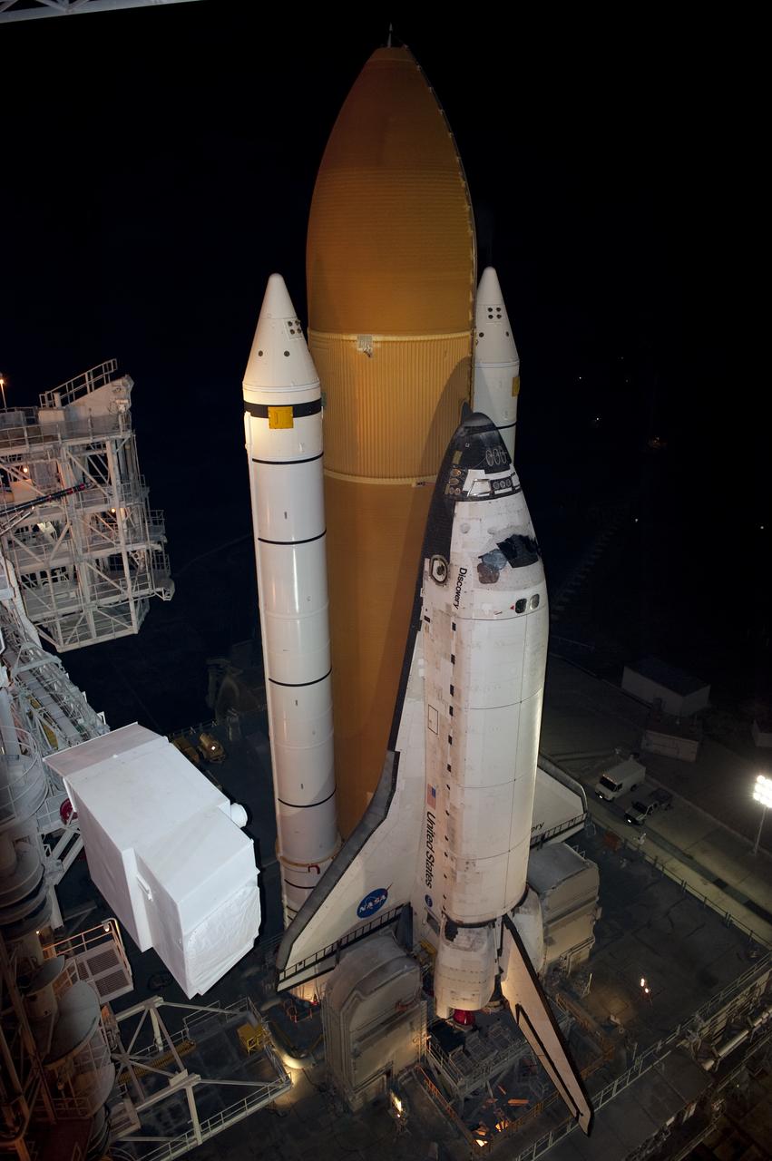 STS-133 Discovery on Pad 39A with Winter Solstice Moon Eclipse - scrubbed Rollback to VAB