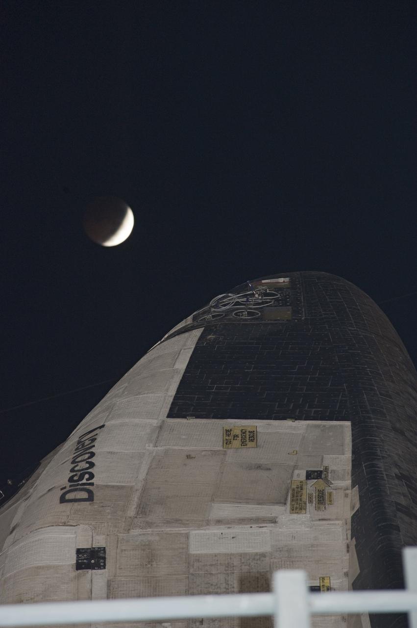 STS-133 Discovery on Pad 39A with Winter Solstice Moon Eclipse - scrubbed Rollback to VAB