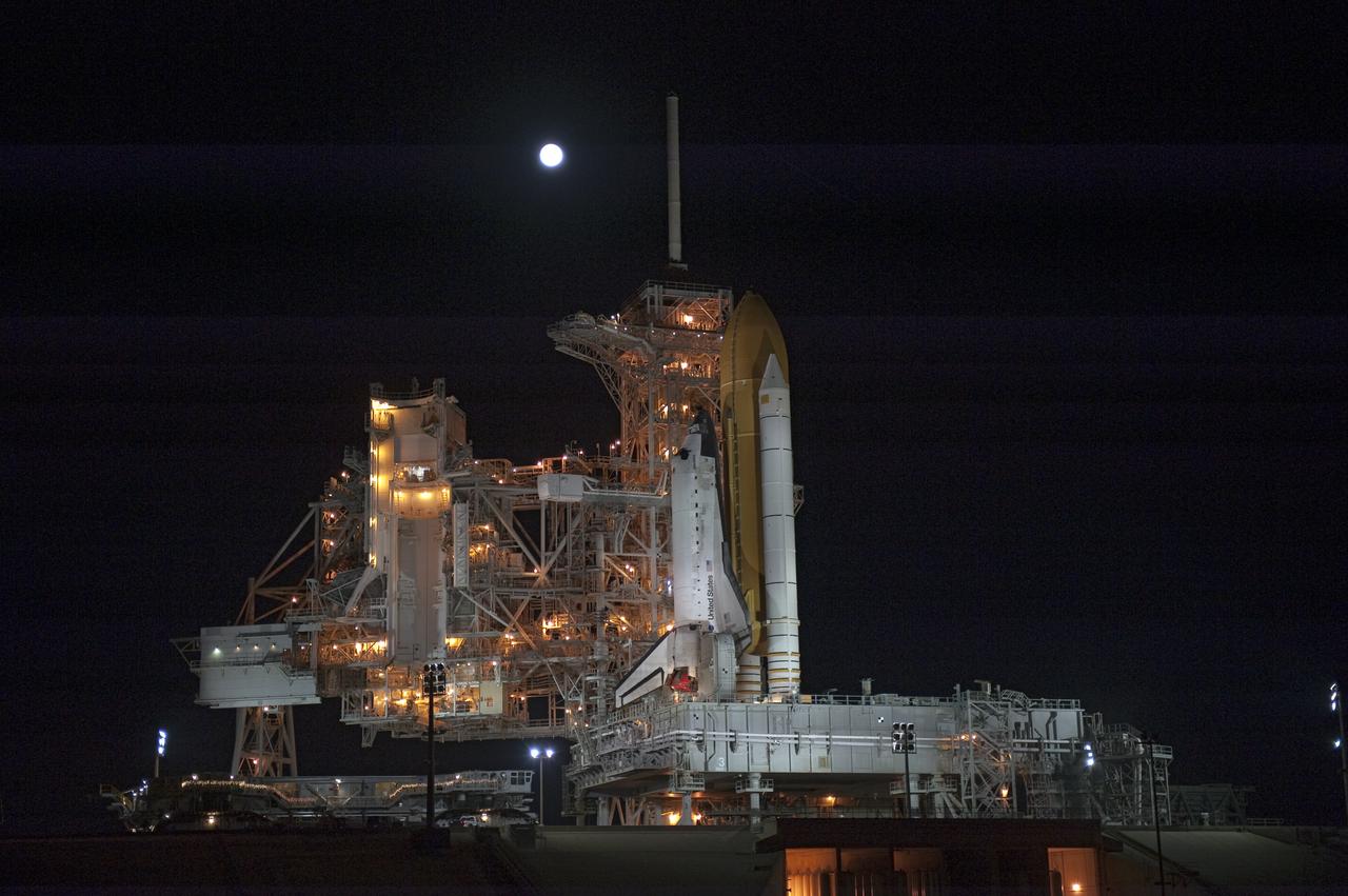 STS-133 Discovery on Pad 39A with Winter Solstice Moon Eclipse - scrubbed Rollback to VAB