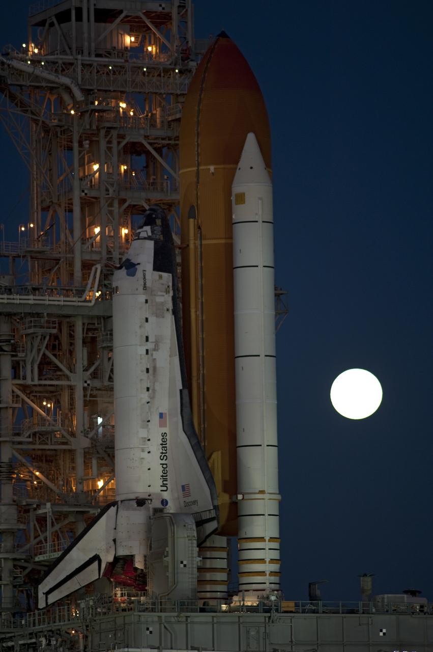 STS-133 Discovery on Pad 39A with Winter Solstice Moon Eclipse - scrubbed Rollback to VAB